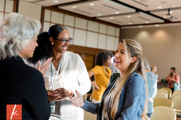 3 woman at a networking event