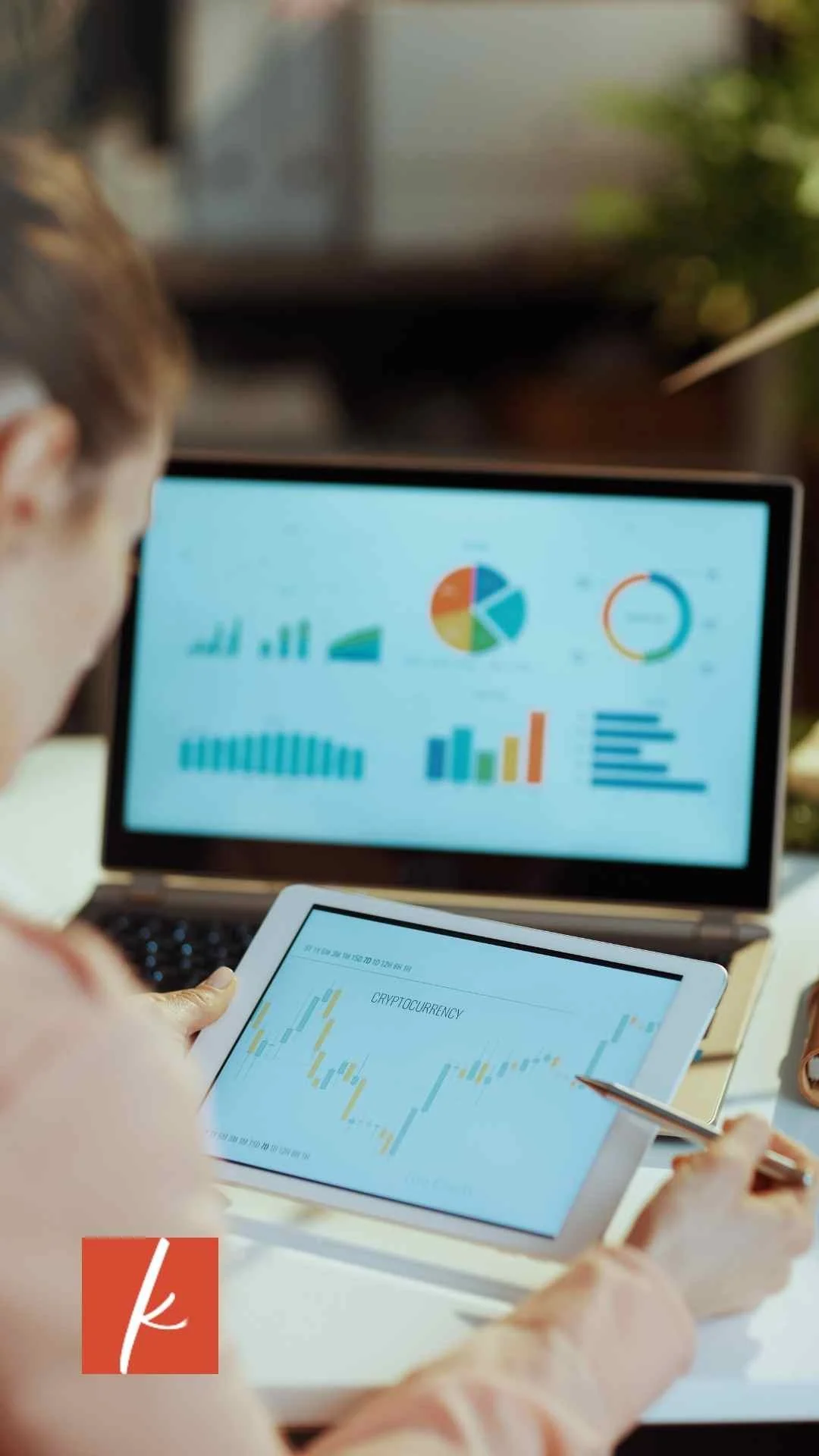 Woman looking at analytics dashboard showing key metrics for small business performance.