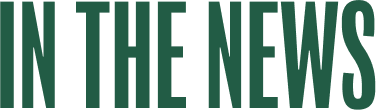 Partial view of text reading 'IN THE NEWS' in green letters on a black background.