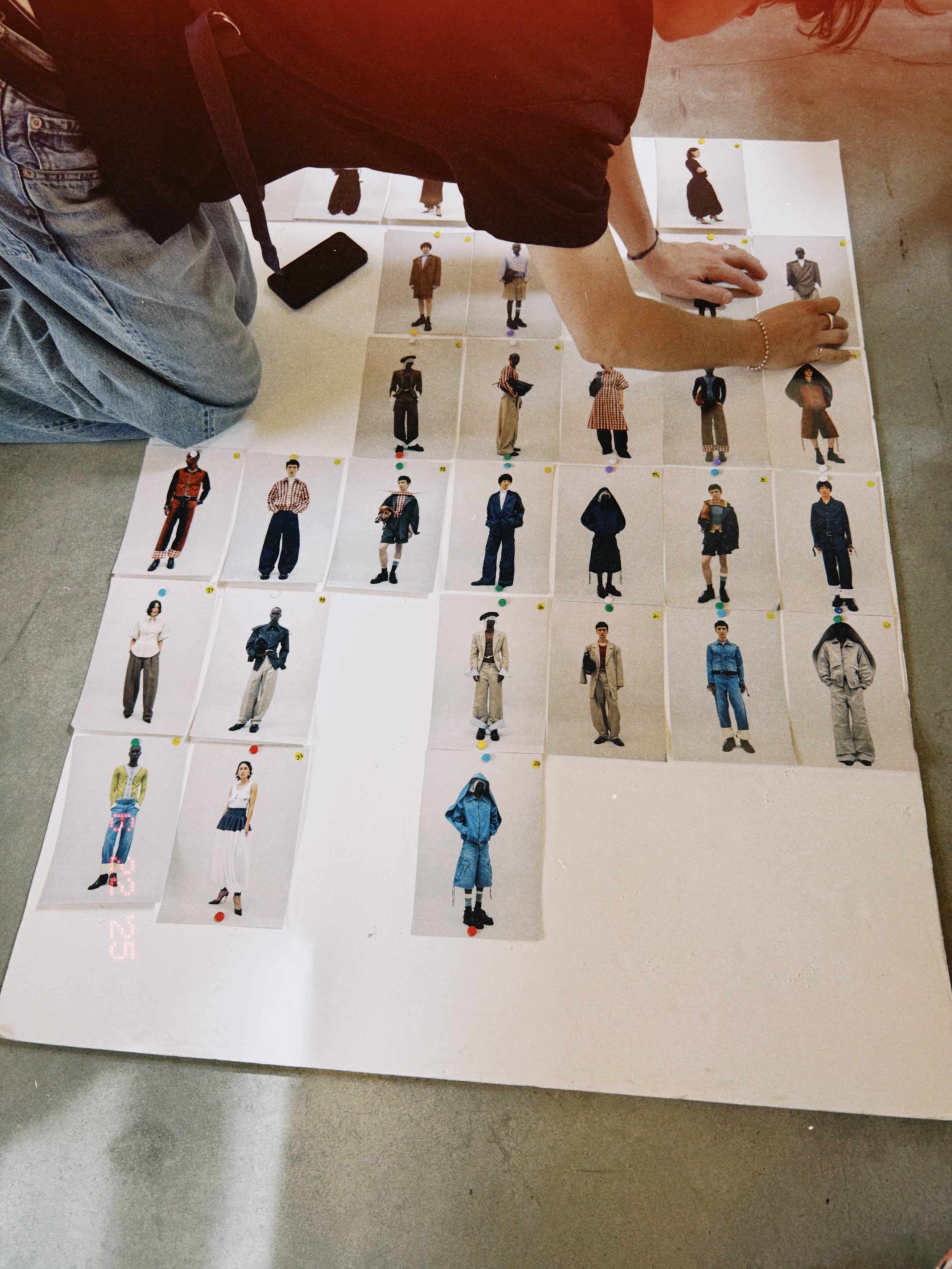 Back view of a garment used to evaluate drape, proportion, and construction during show preparation