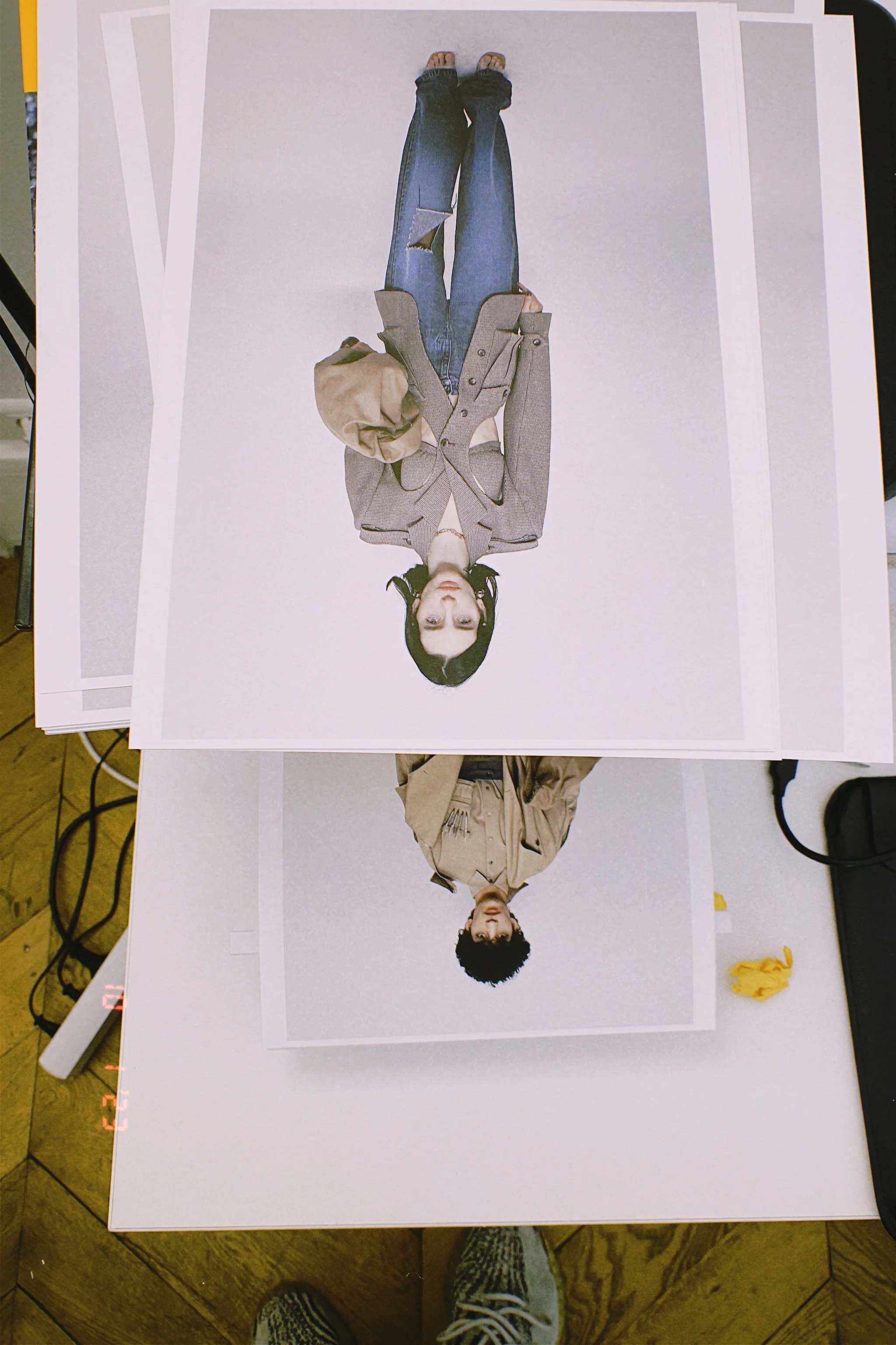 Garment detail reviewed and adjusted during show preparation to ensure readiness for runway use