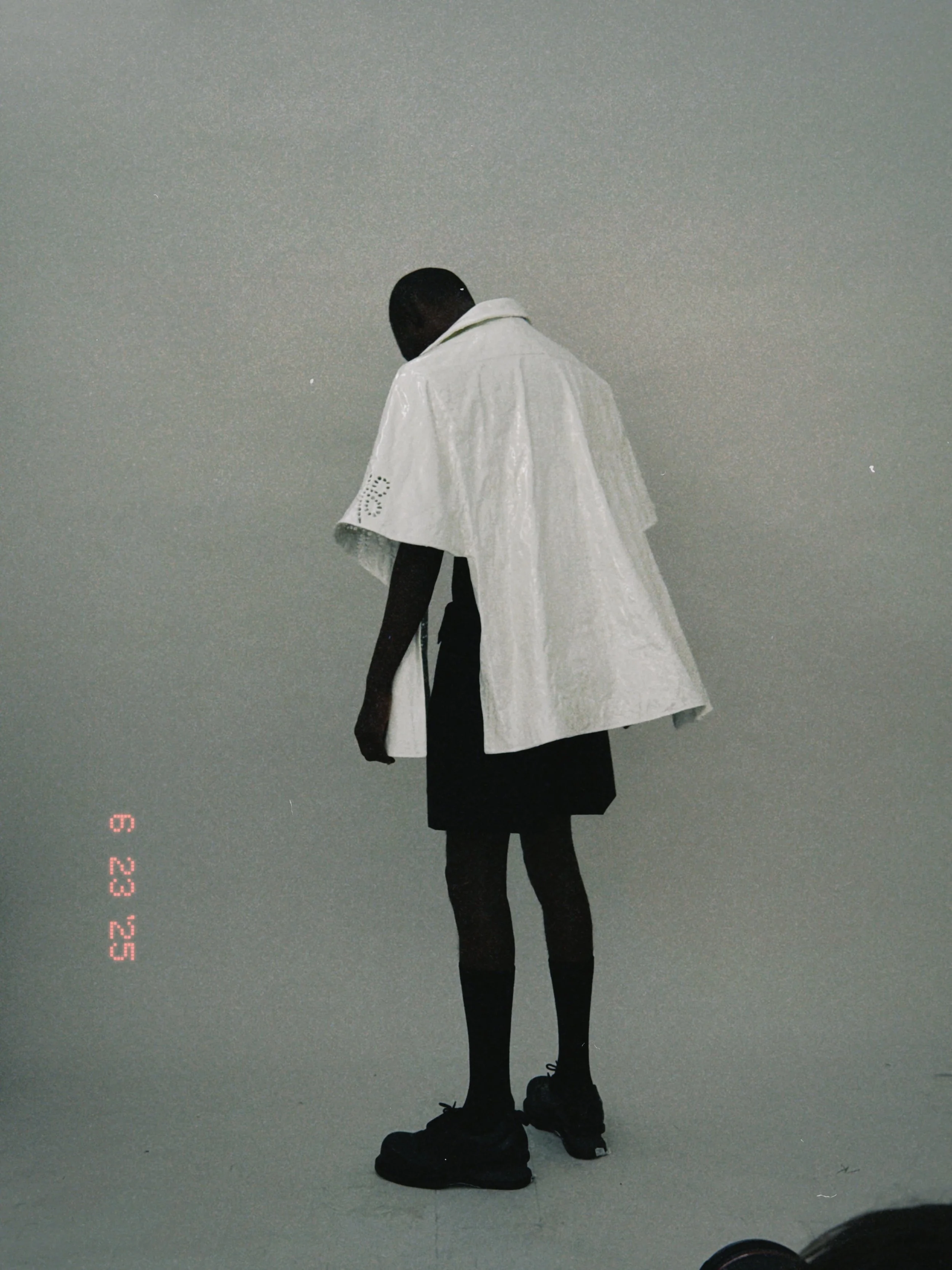 Garment detail reviewed during show preparation to adjust construction and finishing