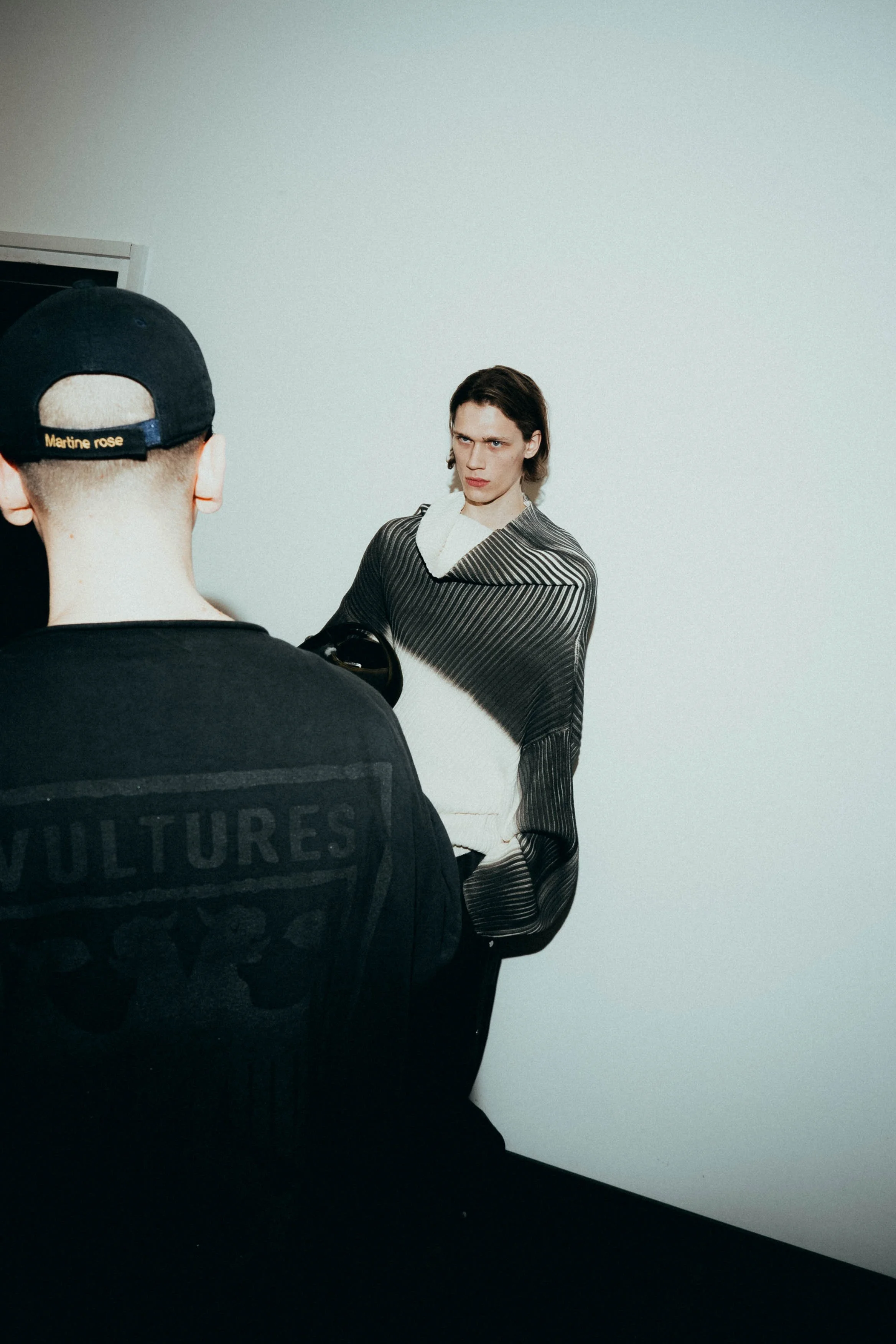 Research materials and references used to define direction and constraints at the start of a fashion project