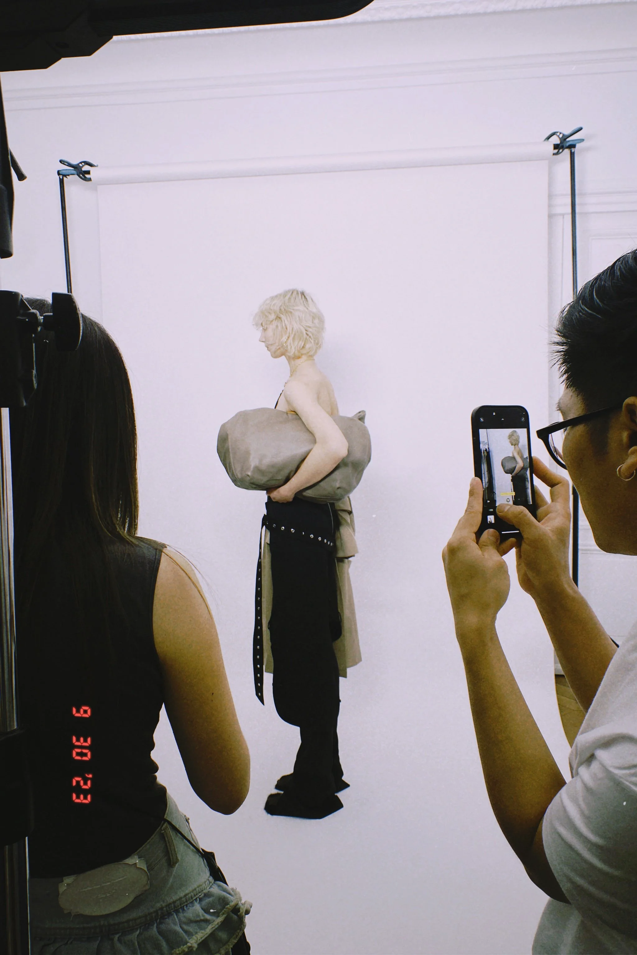 Back view of a garment used to assess construction and proportion during show preparation