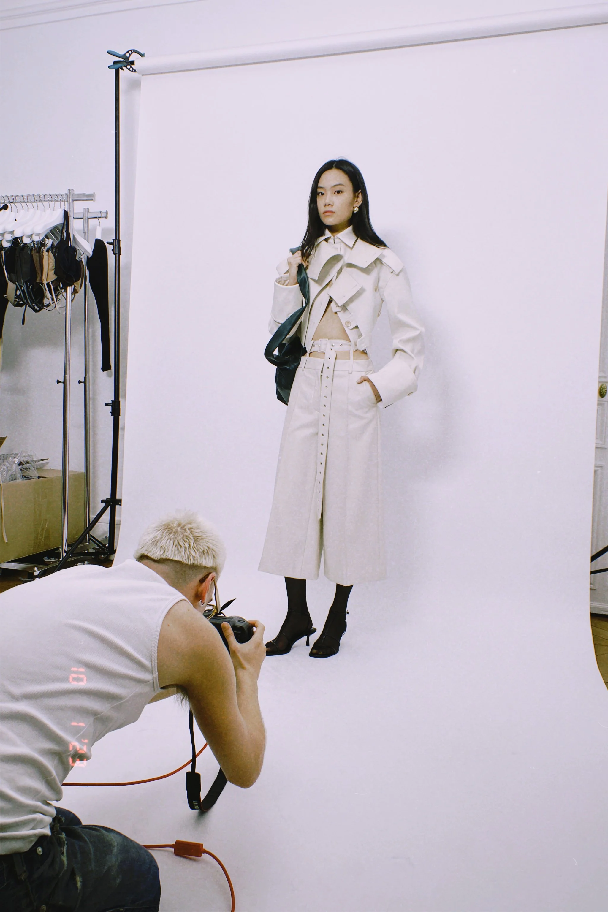 Silhouette review conducted during show preparation to refine balance and proportions before runway presentation