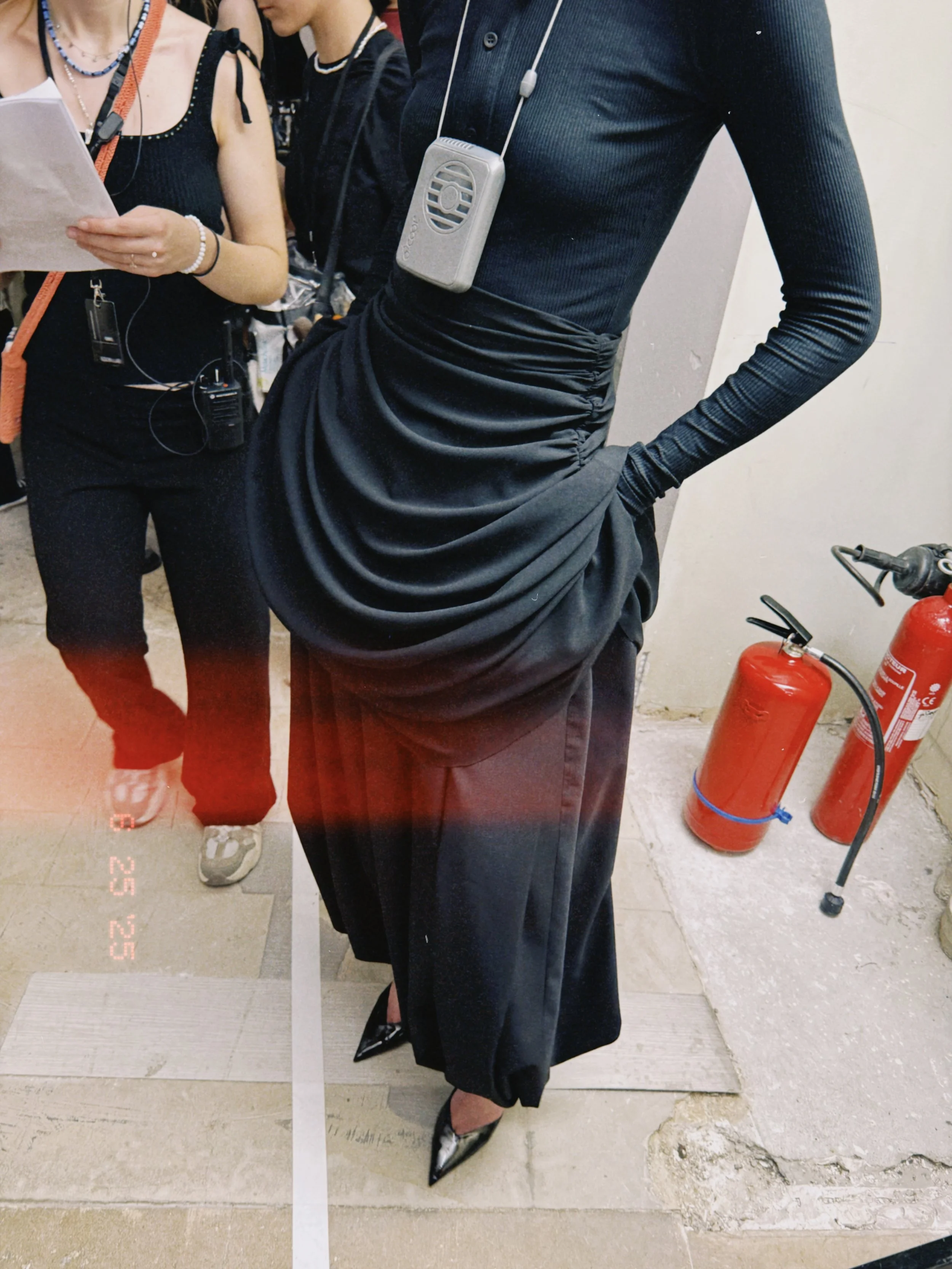 Draping process used to develop volume, balance, and silhouette for a womenswear runway look