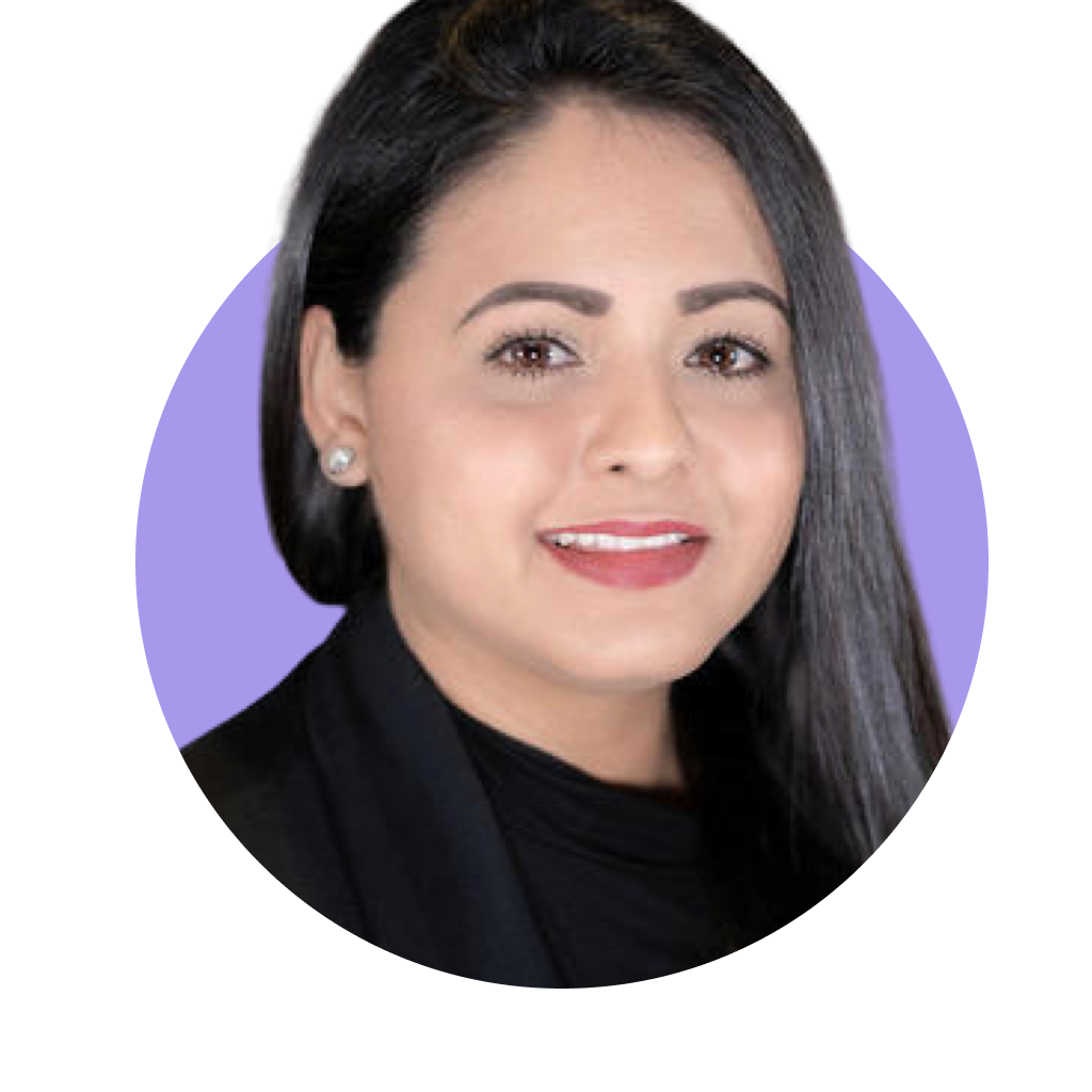 Portrait of a woman with long dark hair, wearing a black blazer and small earrings, smiling, with a purple circular background. Latinx professional. LCSW. Therapist. EMDR. EMDR Consultation. 