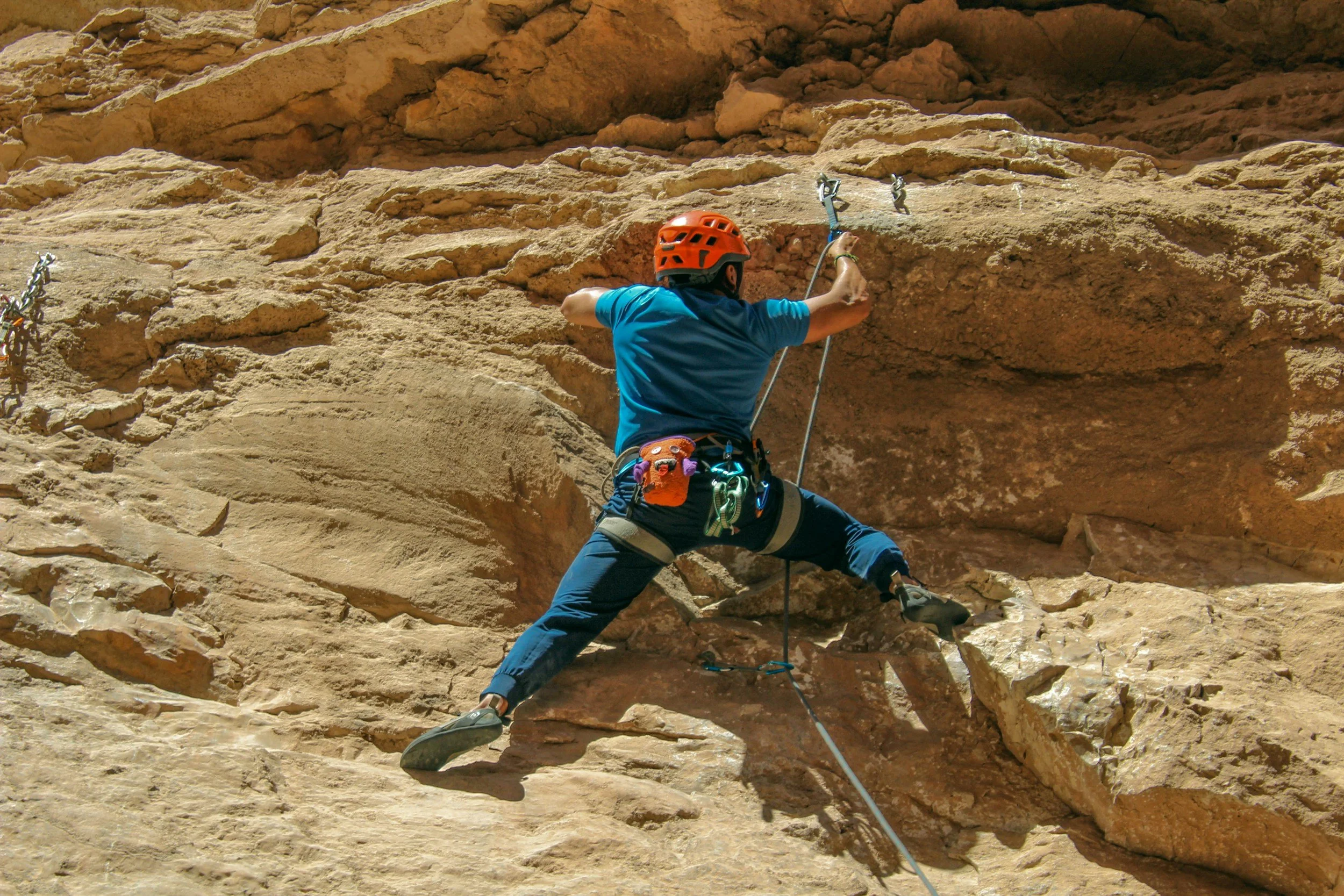 rock climber demonstrating rock climbing