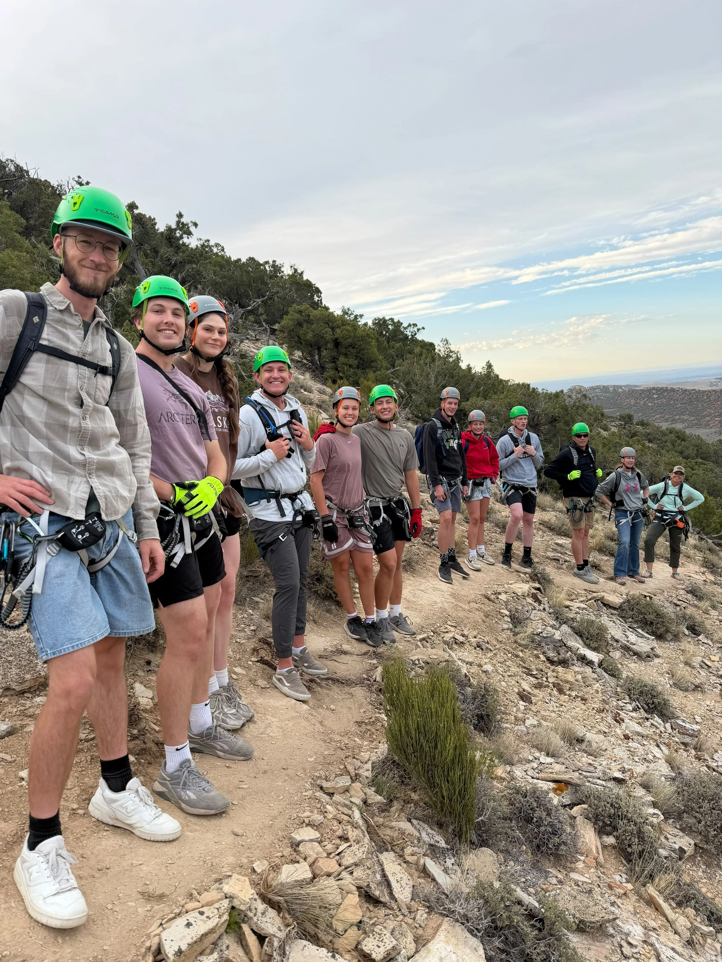 Climbers bypassing the opening Pump features on the upper trail. Trail junction where Above the Pump Trail rejoins the via ferrata.