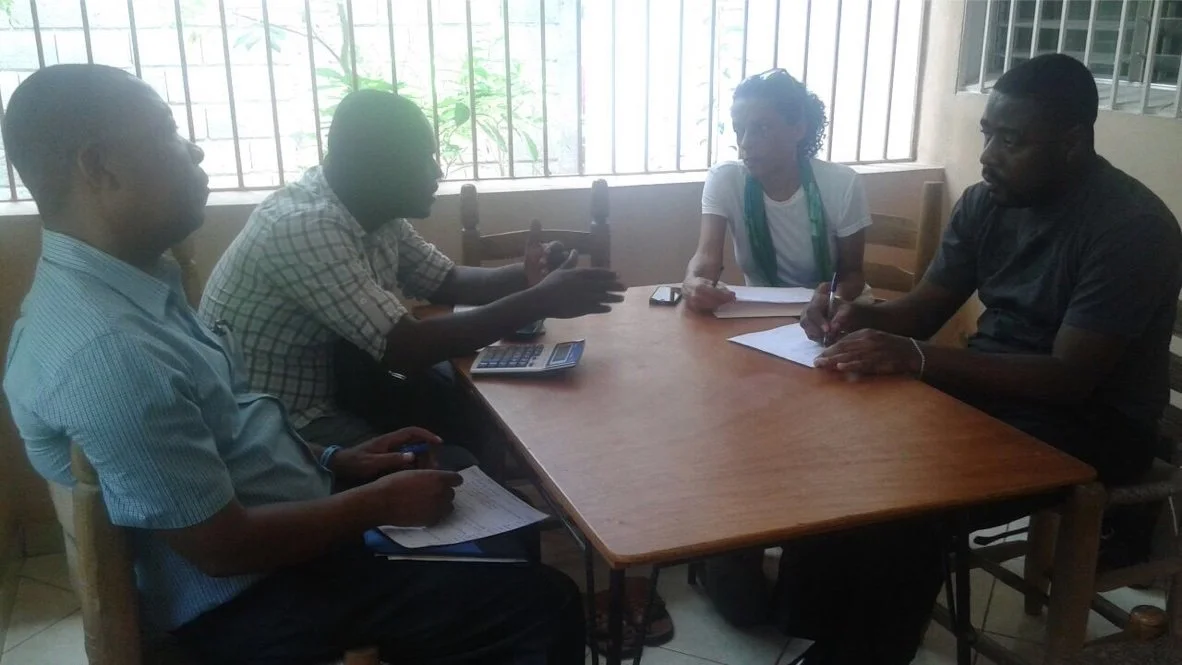 Gregory & Franck (left) at APSHA team meeting in Leogane