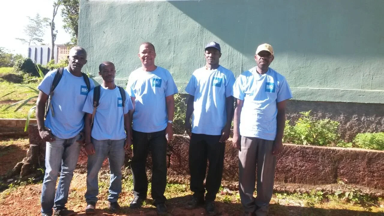 Franck (middle) with 4 goat technicians
