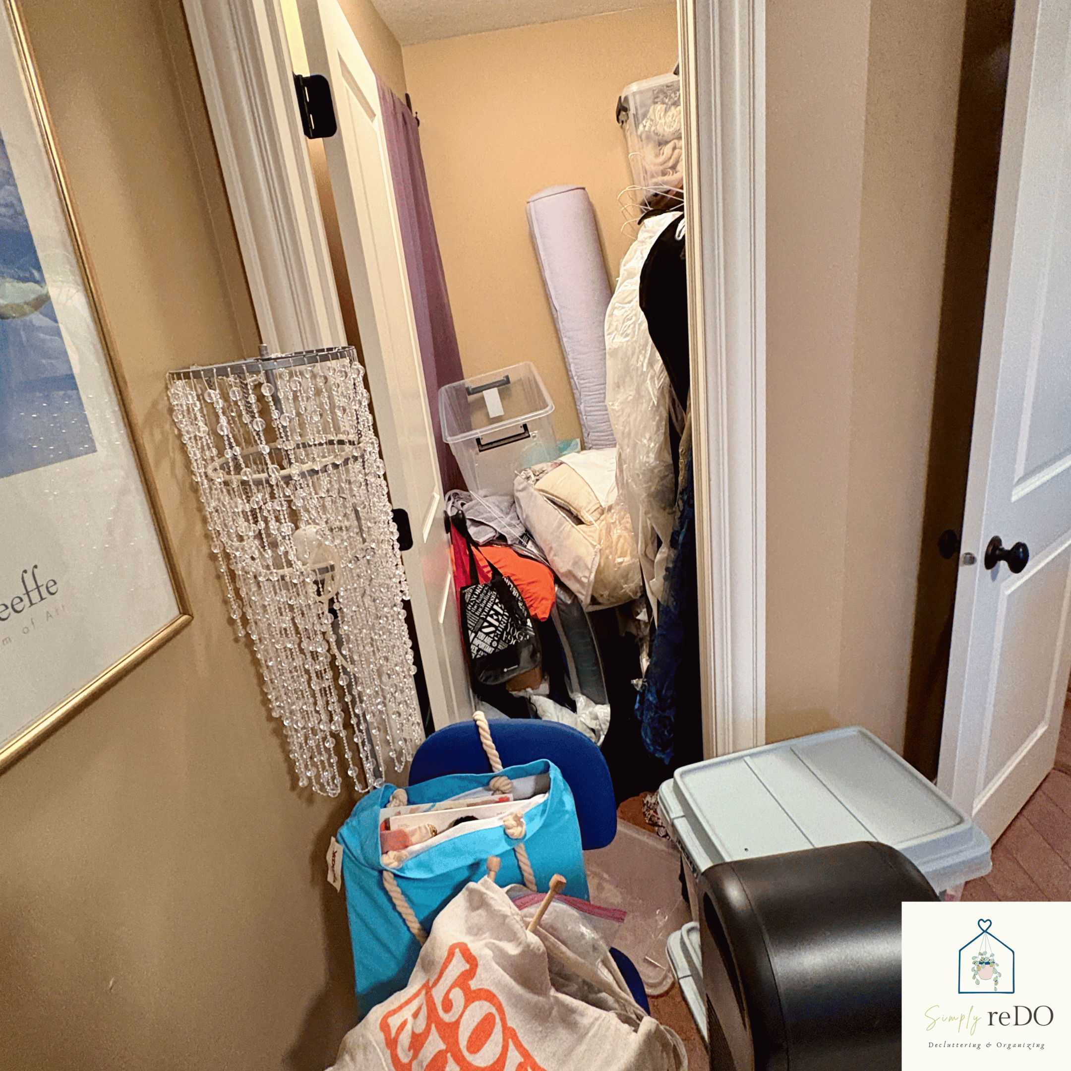 Guest bedroom closet before organizing, with limited visibility and overfilled storage.