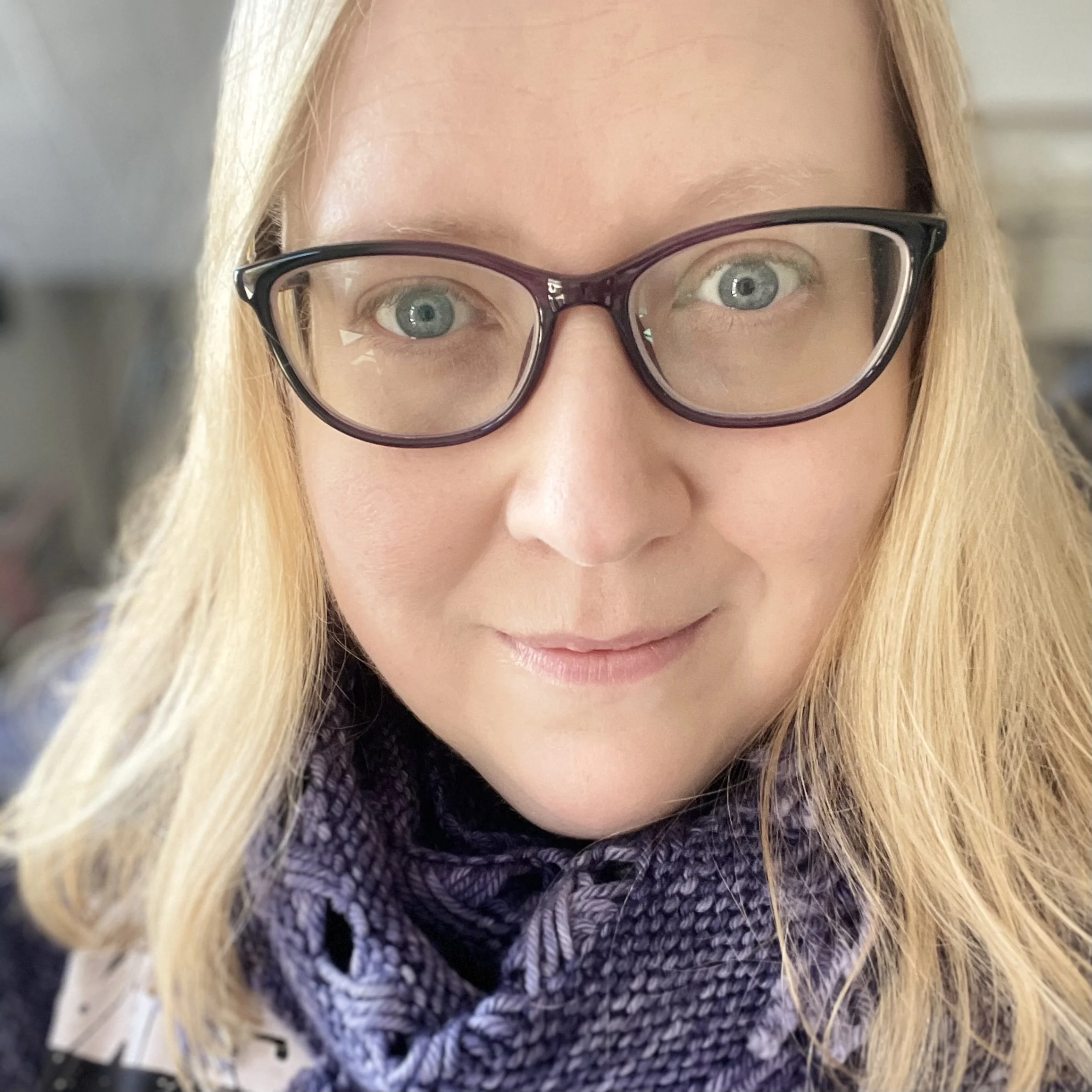 Claire Anketell Inspiring Yarns CEO wearing knitted shawl
