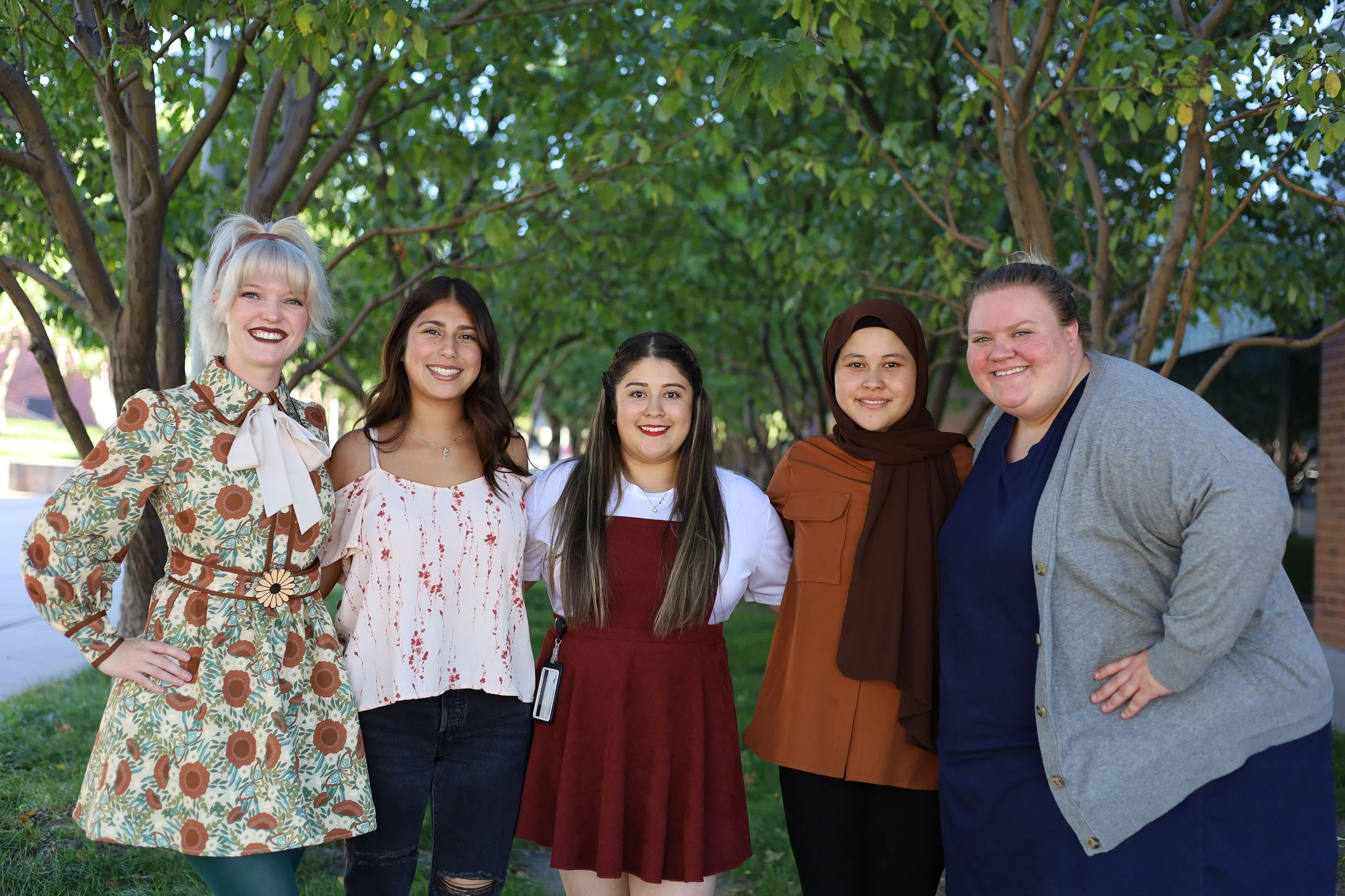 Whitney Haddad with fellow Girls Who Code officers at MSU Denver, standing together outdoors on campus.