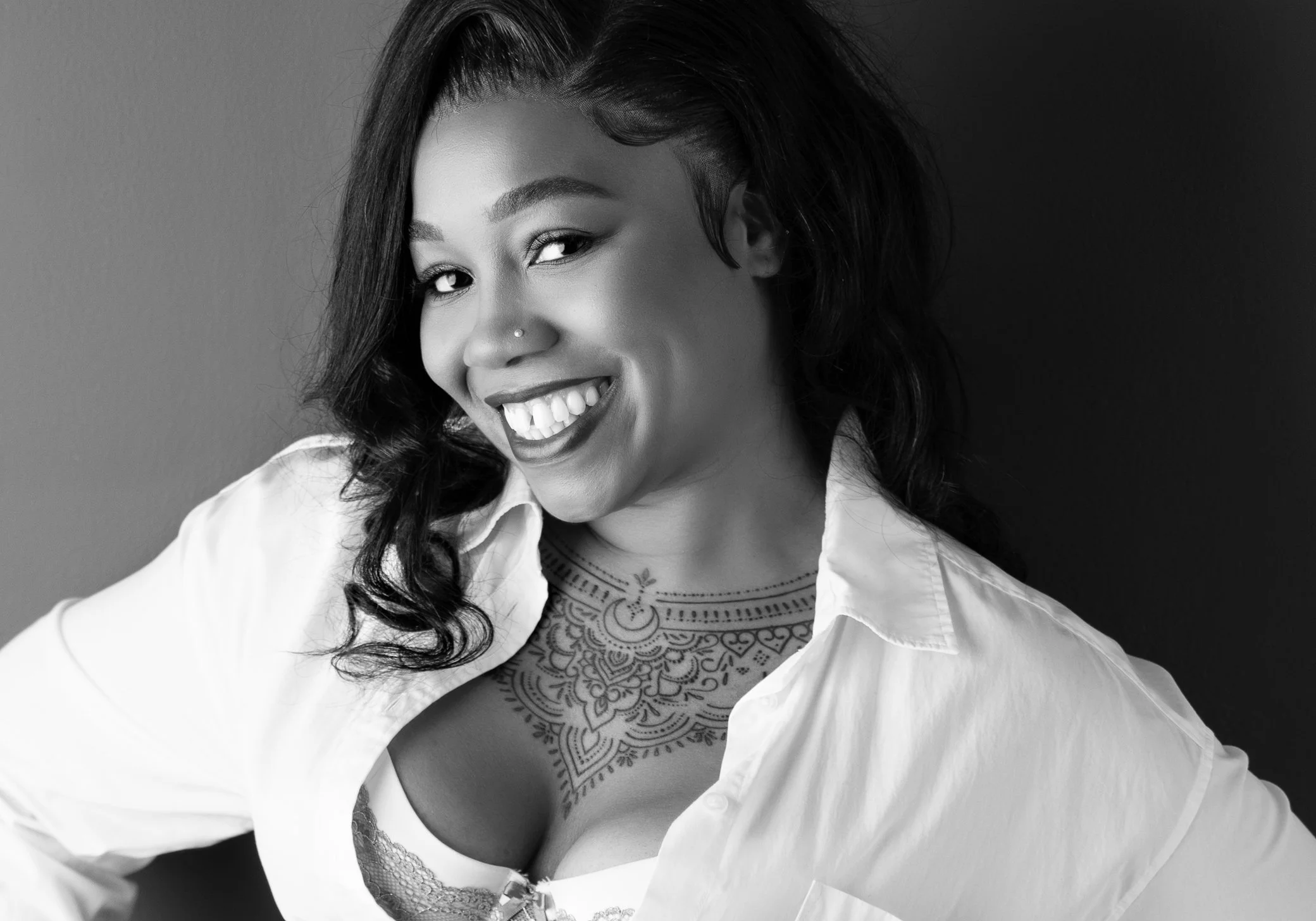 joyful-confidence-boudoir-portrait-smiling-woman-black-and-white.jpg