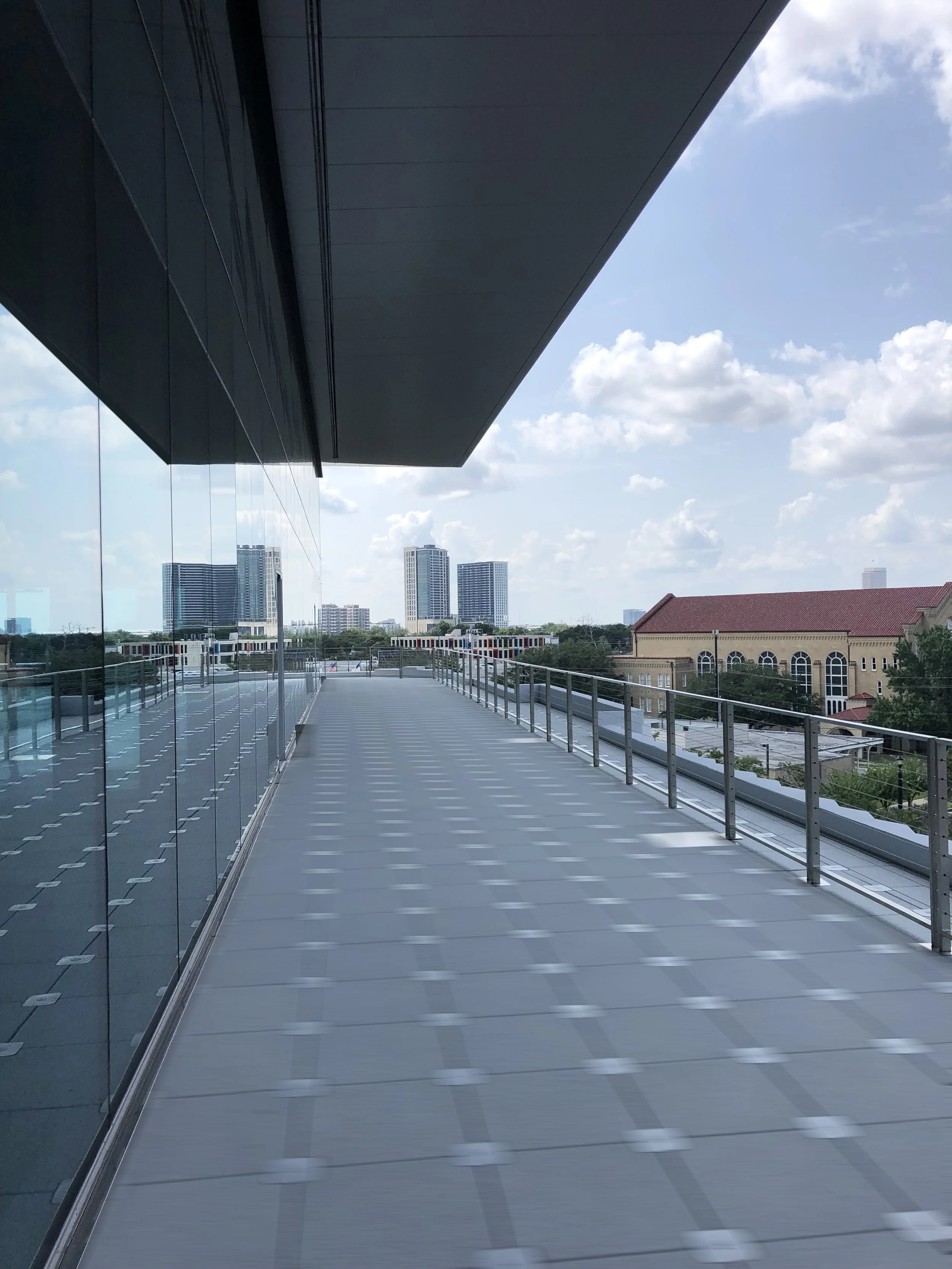 Shaded balcony overlooking downtown Houston