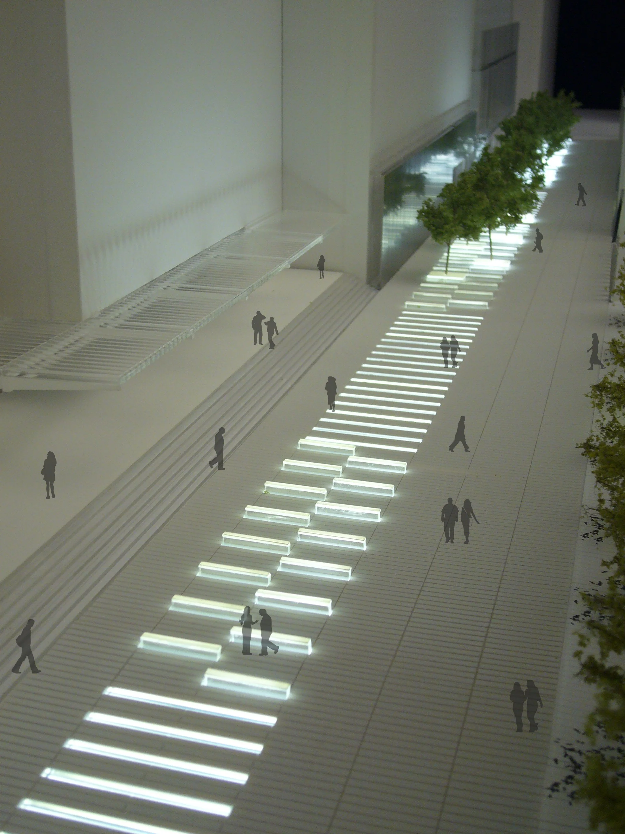 Physical model of aerial view of 33rd street with benches and light monitors that connected to the activity of station below