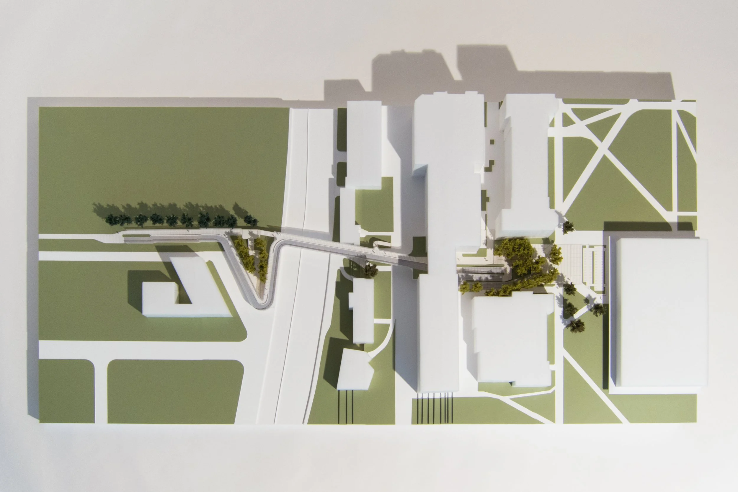 Bird's-eye view architectural model of Washington University campus buildings and connector pathways.