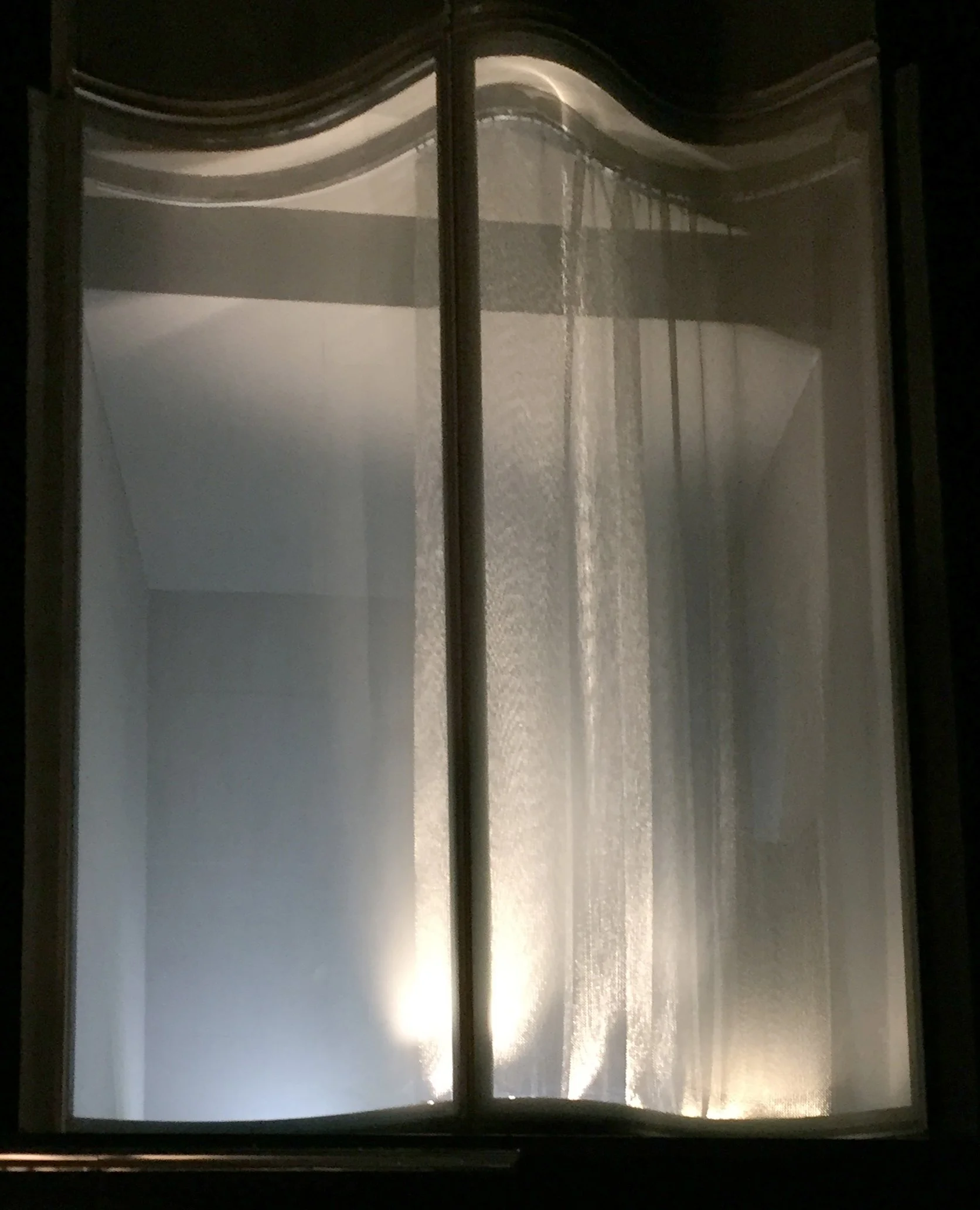 Test of what the mesh and glass facade would look like at night when lit from below