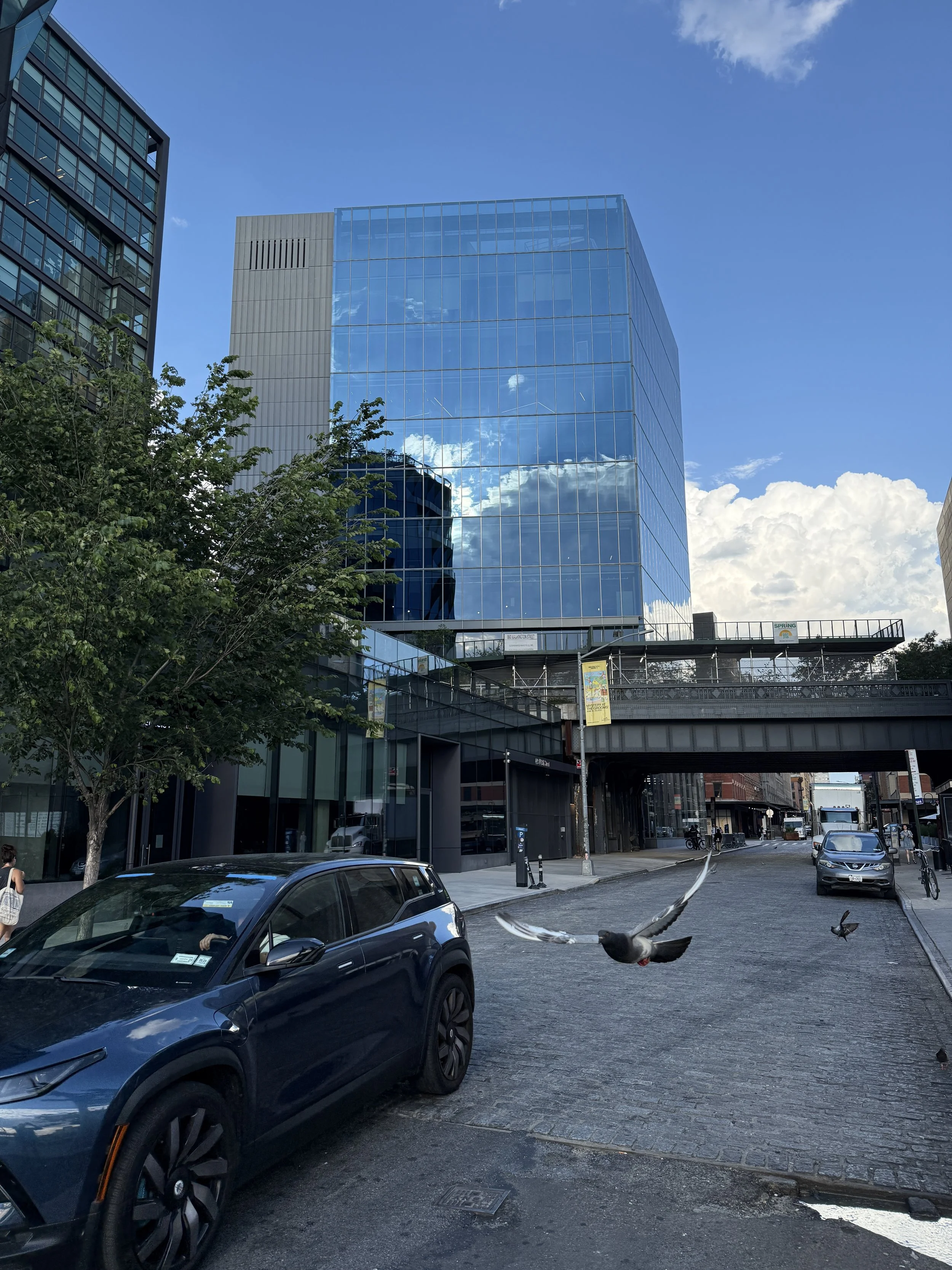 Street level view of building and highline