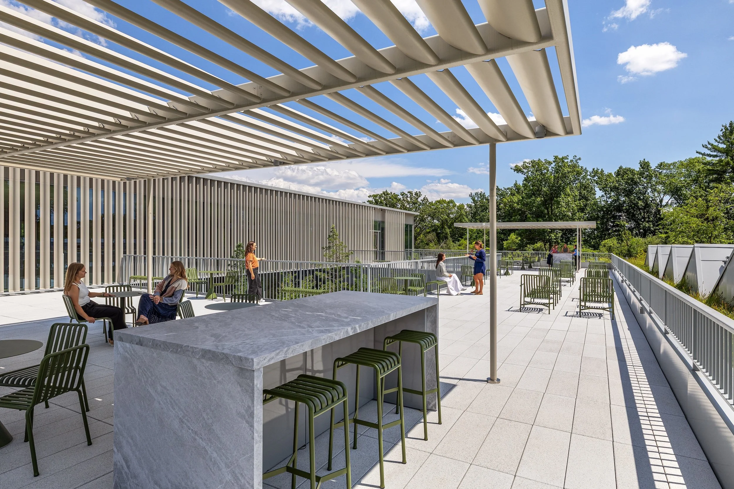 Occupied terrace with partial shade covering 