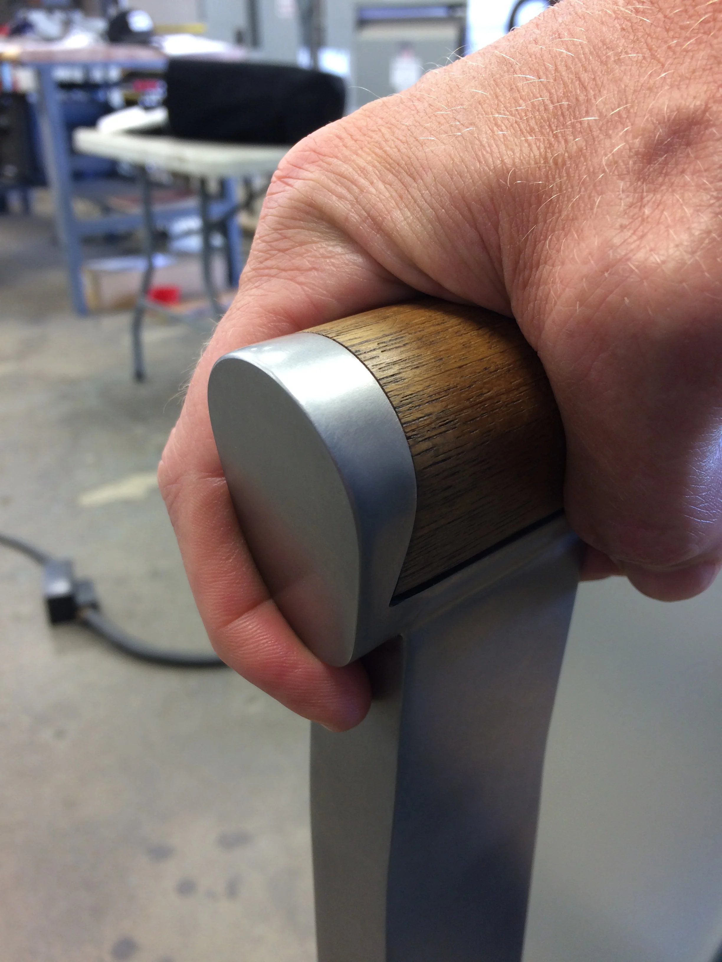 Custom shaped stanchion to fit your hand on staircase railing