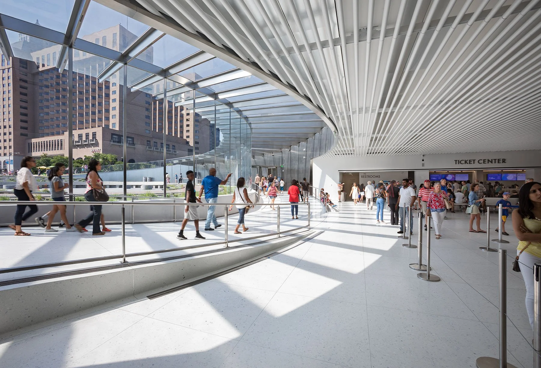 coming through entry down ramps towards the ticket center