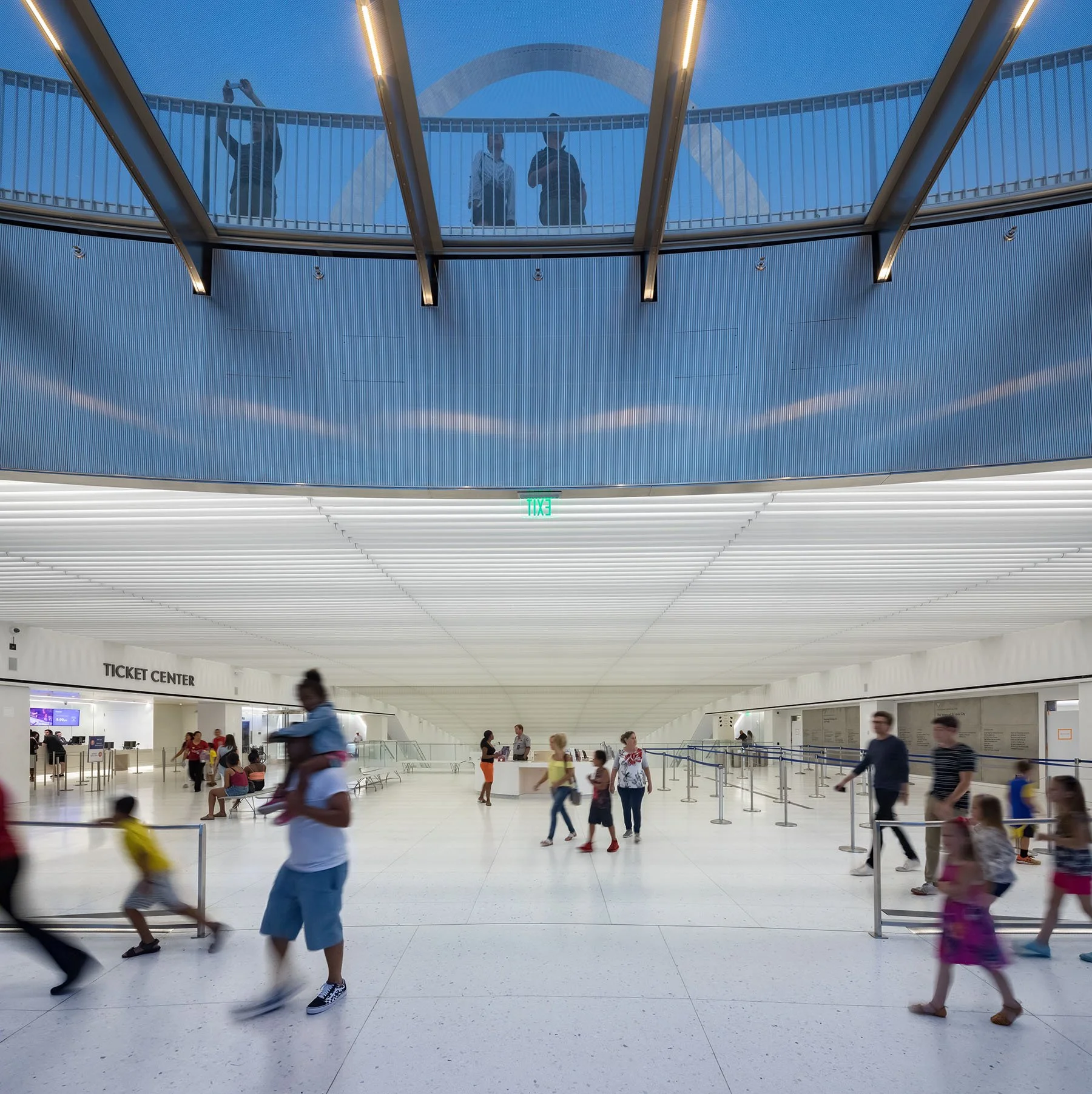 view looking back up at the top of the arch through the glass
