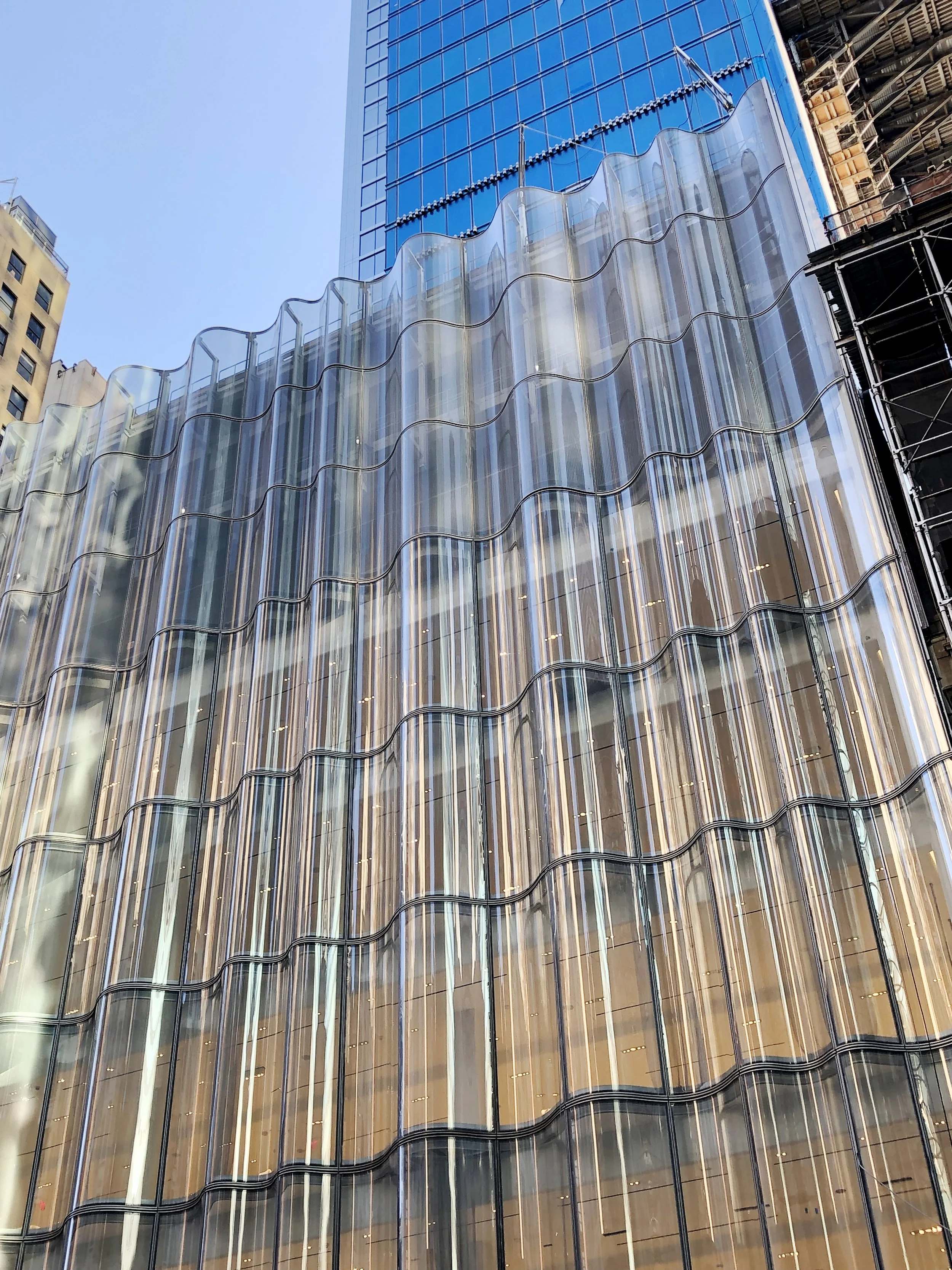 Glass facade in progress being placed on Nordstrom 