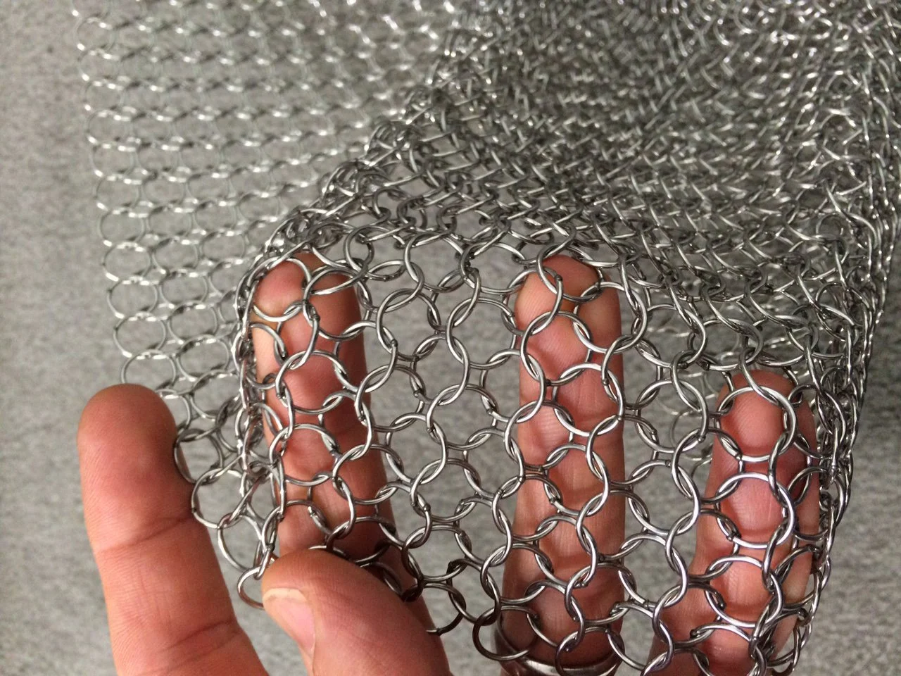 Close up of the mesh curtain with material called alphamesh