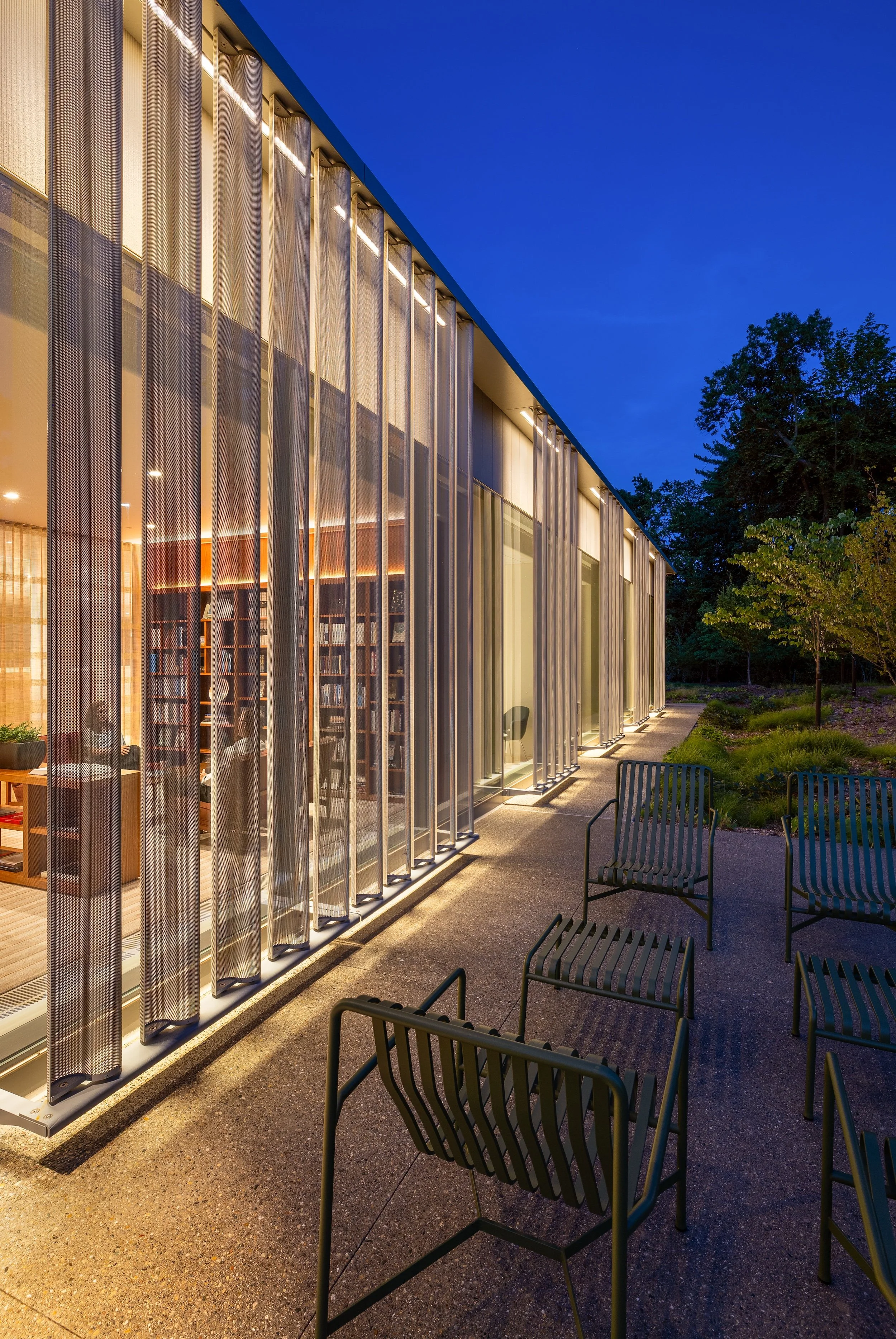 view into the library from outside at night