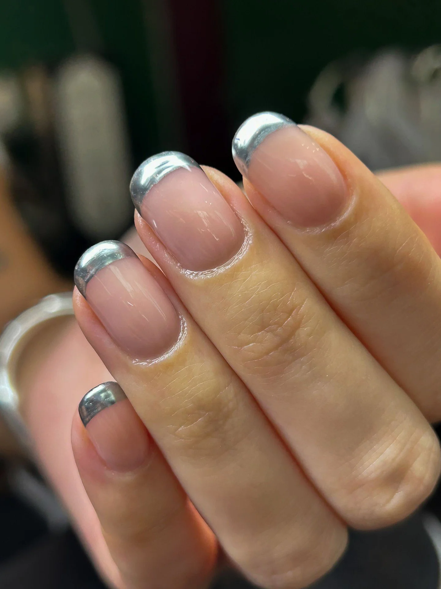 Honestly if you want to know if you have a high quality nail tech the usual rule of thumb is to see how they execute a solid red manicure BUT...a chrome French would have many techs shaking in their boots and would also be an interesting test of skil
