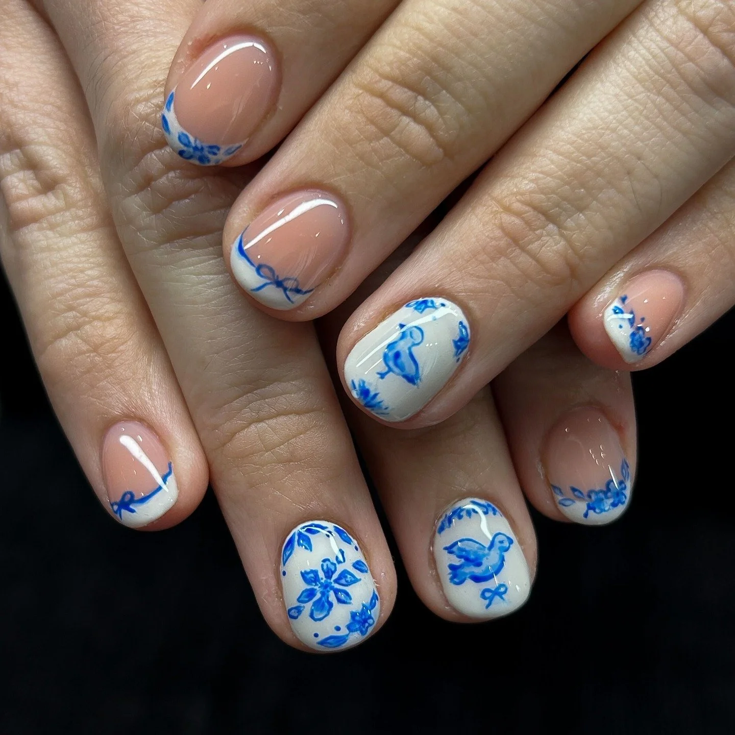 No such thing as too dainty or delicate! 

These perfectly crafted porcelain nails are the handiwork and artistry of 'Cureist Tu- Anh and are an example of what some inspiration and a Custom Level Nail Art can get you! 

Bring your hands and your pla