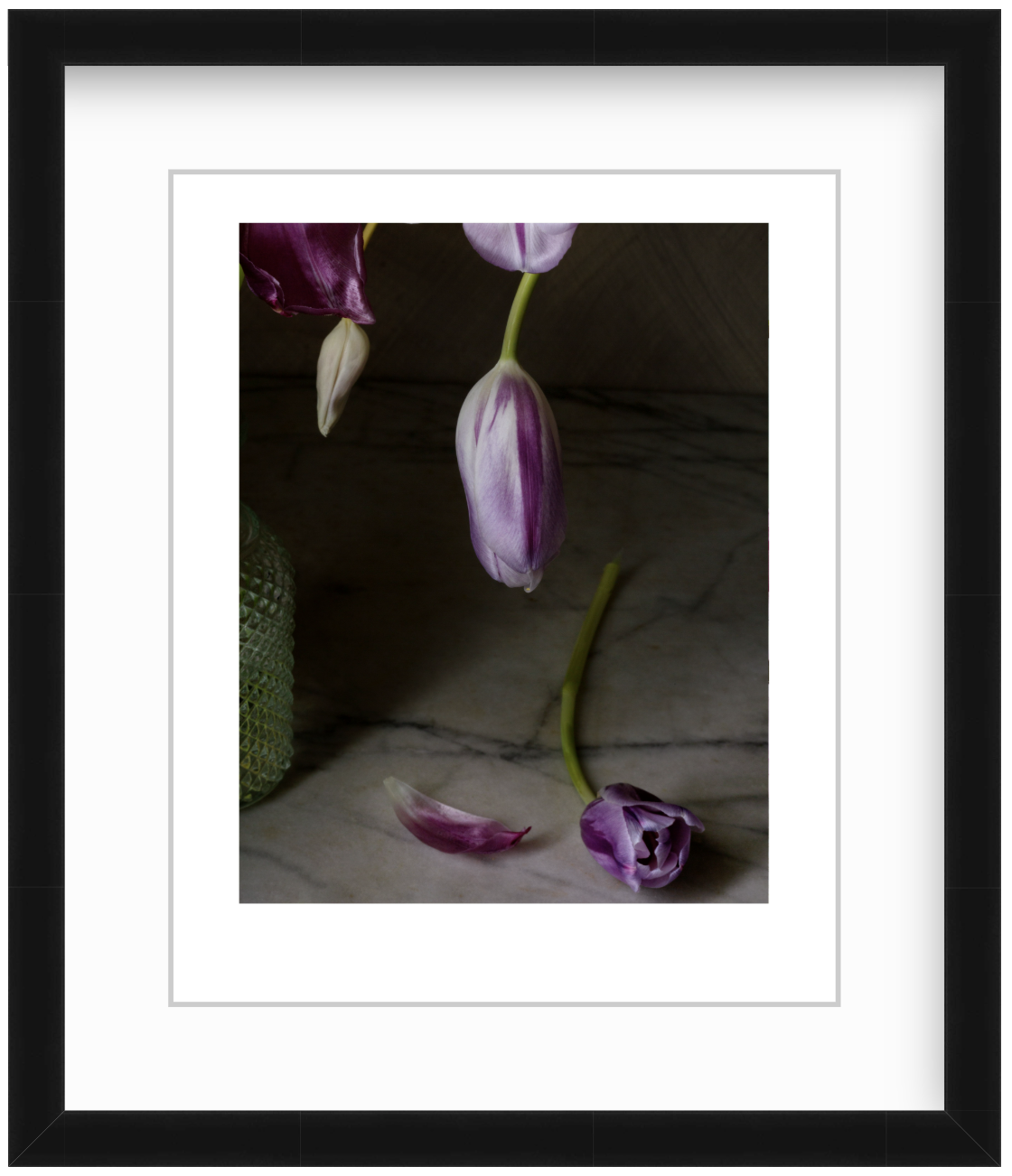 Purple tulips arranged in a modern studio still life with minimalist styling and soft, even lighting.