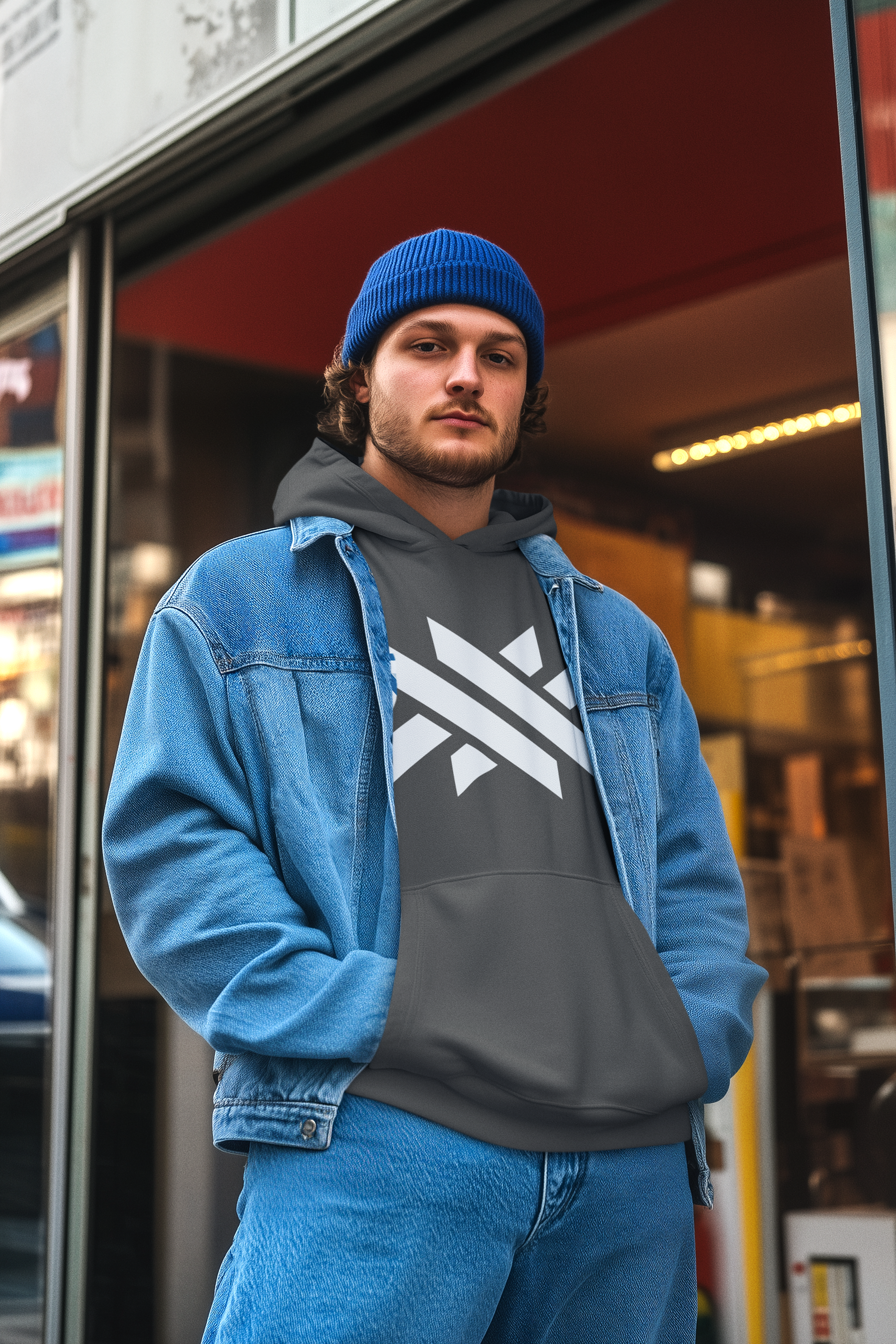 pullover-hoodie-mockup-of-an-ai-generated-bearded-man-standing-outside-a-store-m56371.png