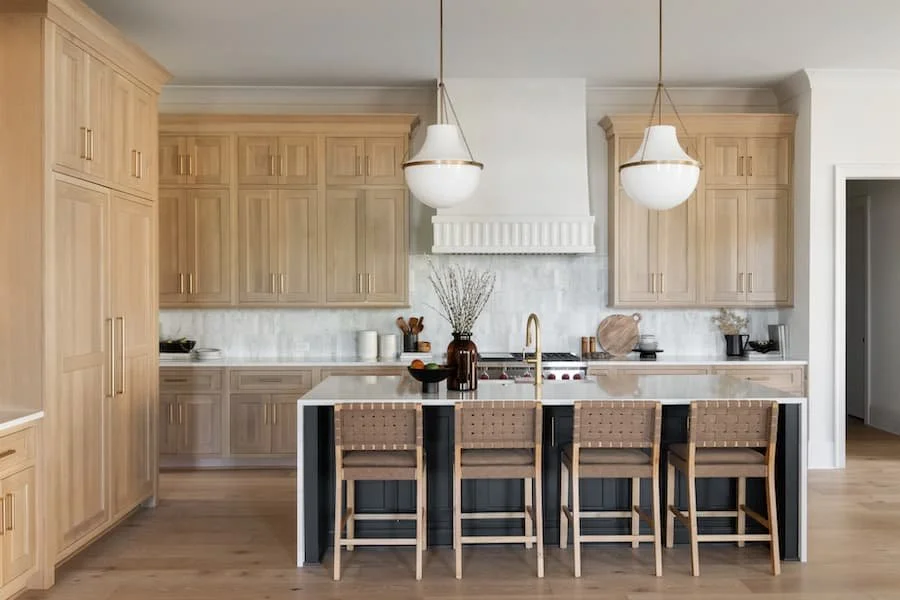 chefs kitchen - photo of a luxury kitchen from behind the island, facing the stove