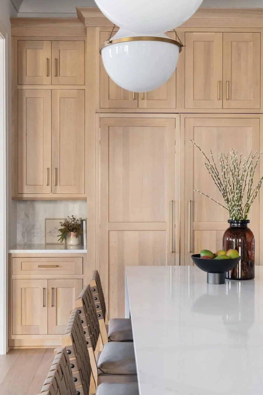 zurich homes - kitchen counter height - side-view of a kitchen island and stools