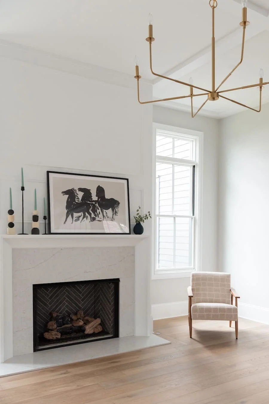 fireplace mantels / fireplace mantel ideas - white marble fireplace with a wood surround and mantel