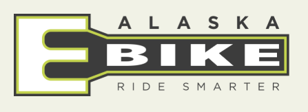 Alaska Bike Ride Smarter logo with stylized E-shaped design, black, green, and white colors.
