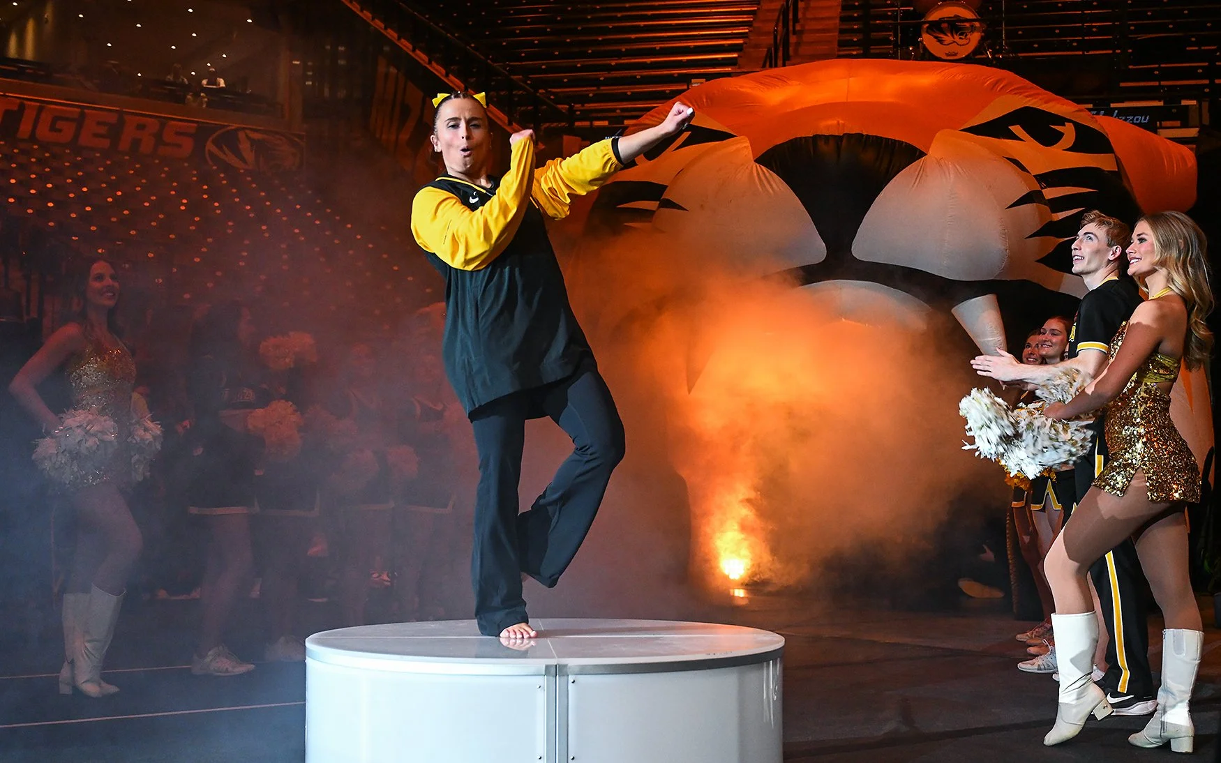 Mizzou junior Dakota Essenpries enters the arena and dances in front of the crowd at the Black & Gold Meet on Friday at Mizzou Arena in Columbia. Essenpries tied for second overall for the vault with a score of 9.850, just behind Railey Jackson. Lily