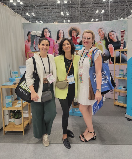 female entrepreneurs standing togther