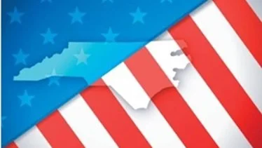 American flag with torn and tattered appearance