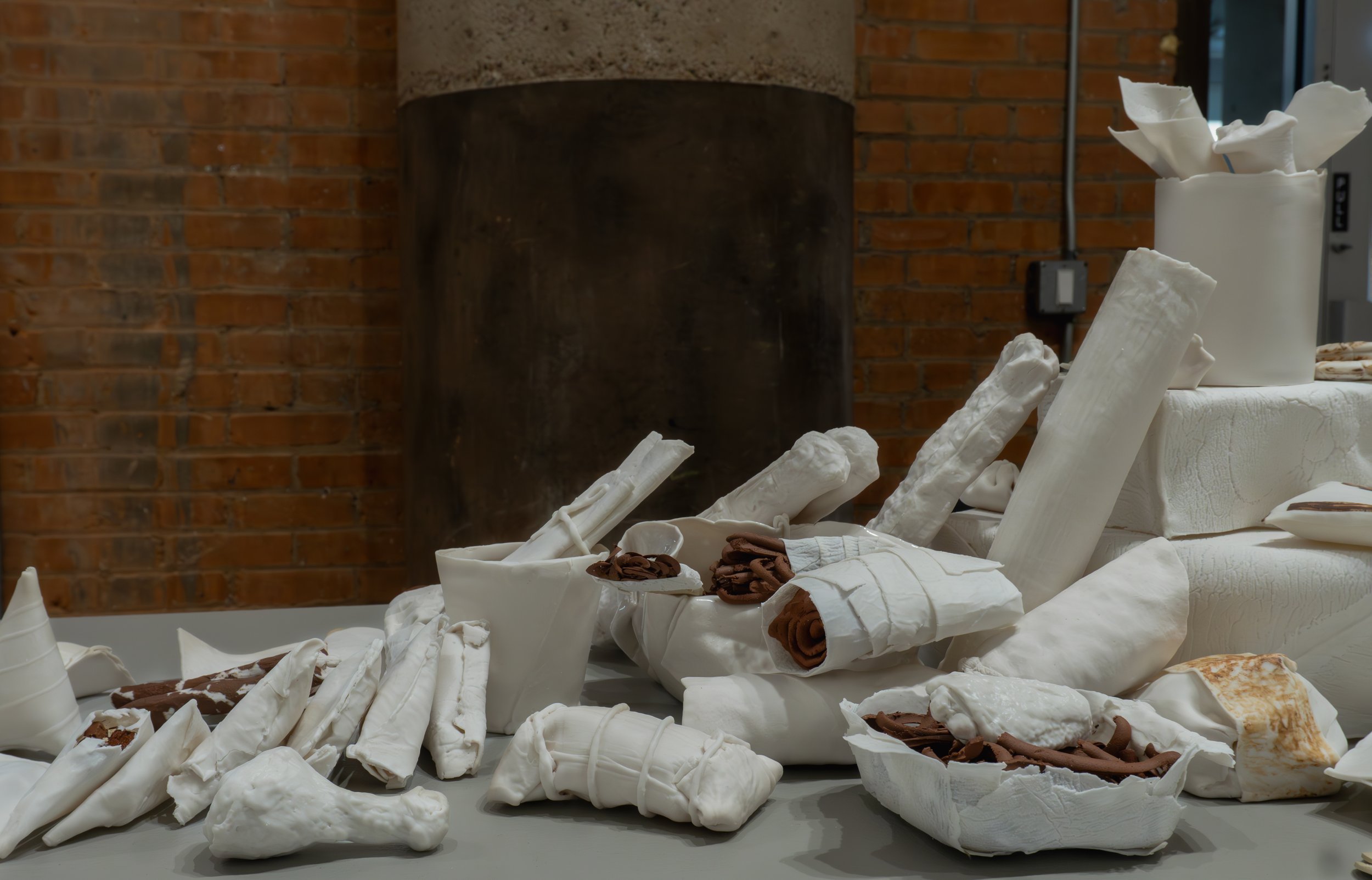FRAGMENTS OF HOME I 2026  
porcelain, stoneware, glaze, underglaze 
10 × 12 ½ × 54 ¼ inches