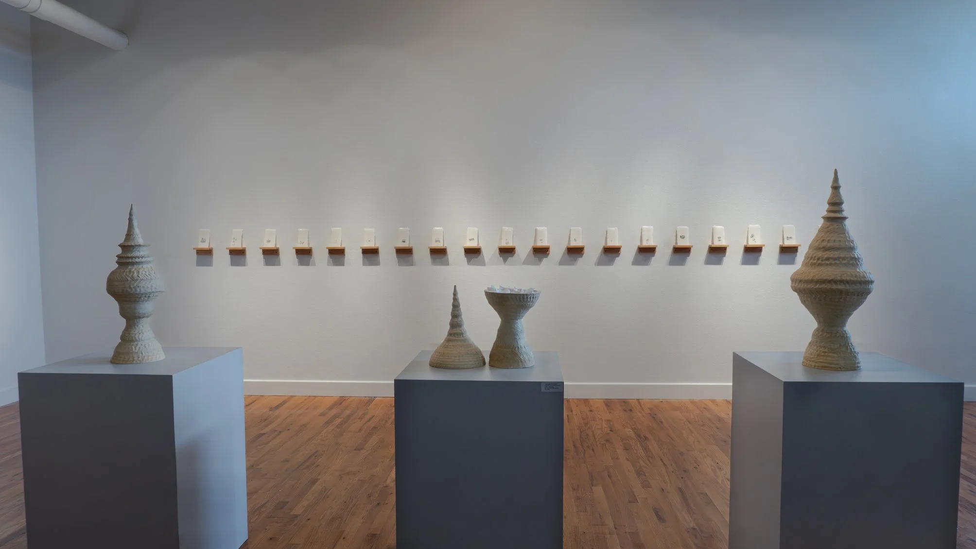 FROM THE FATHERLAND  2026  
porcelain, stoneware, glaze, underglaze  
variables