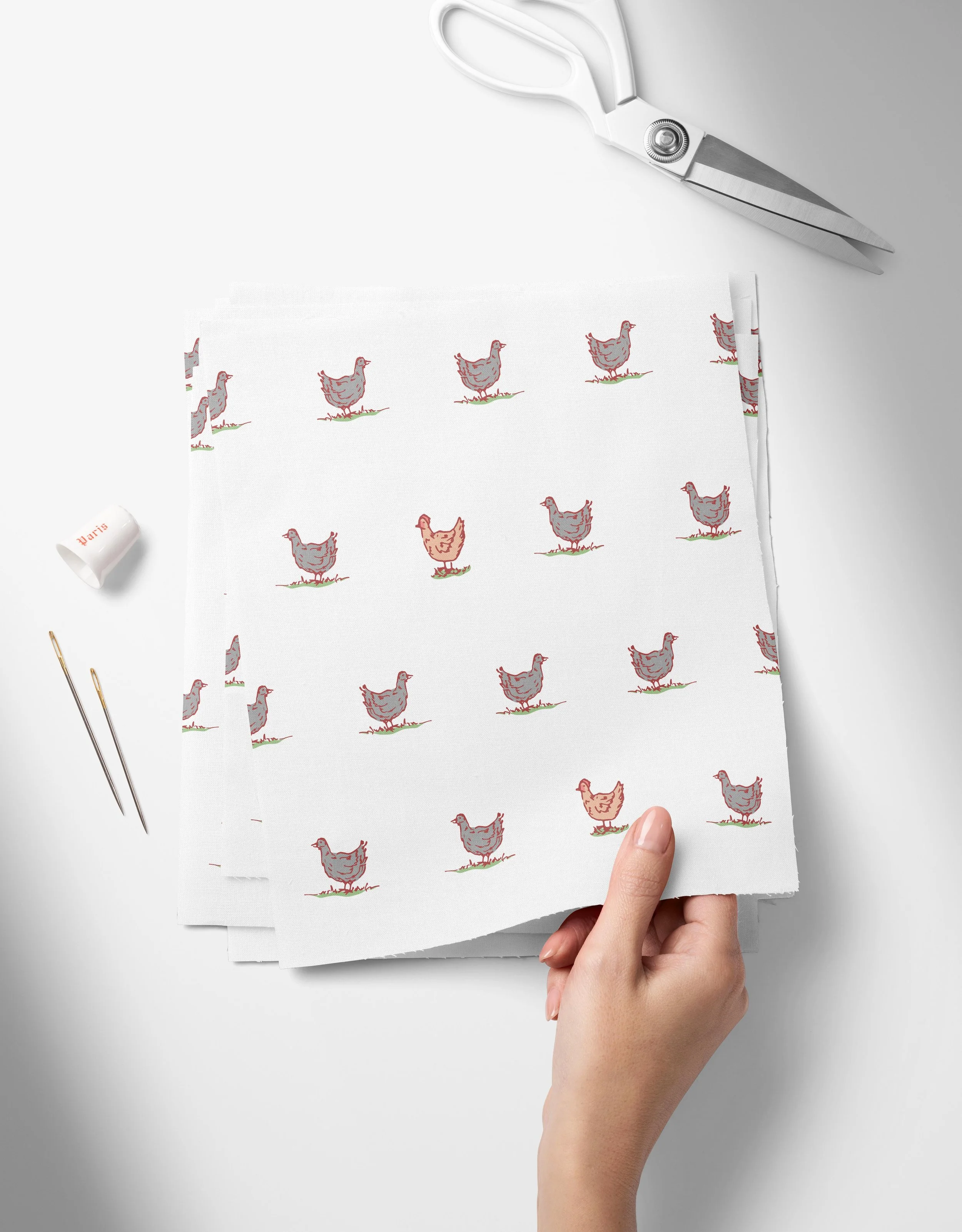 Chickens-white-01_Top View of Fabric Swatches Held in Hand Mockup by Creatsy®.jpg