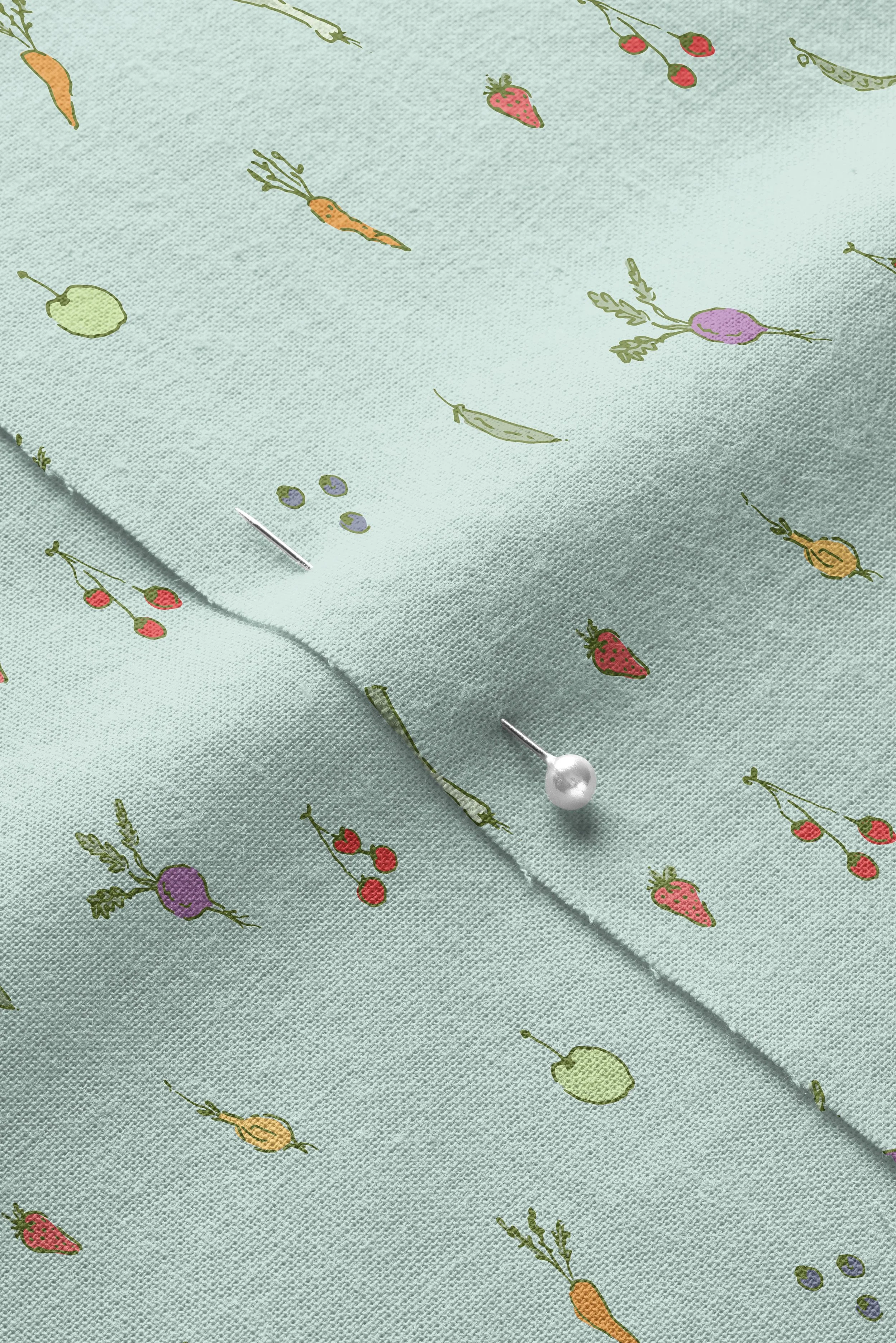 Veggies-blue-01_Closeup of Pinned Cotton Fabric Mockup by Creatsy®.jpg
