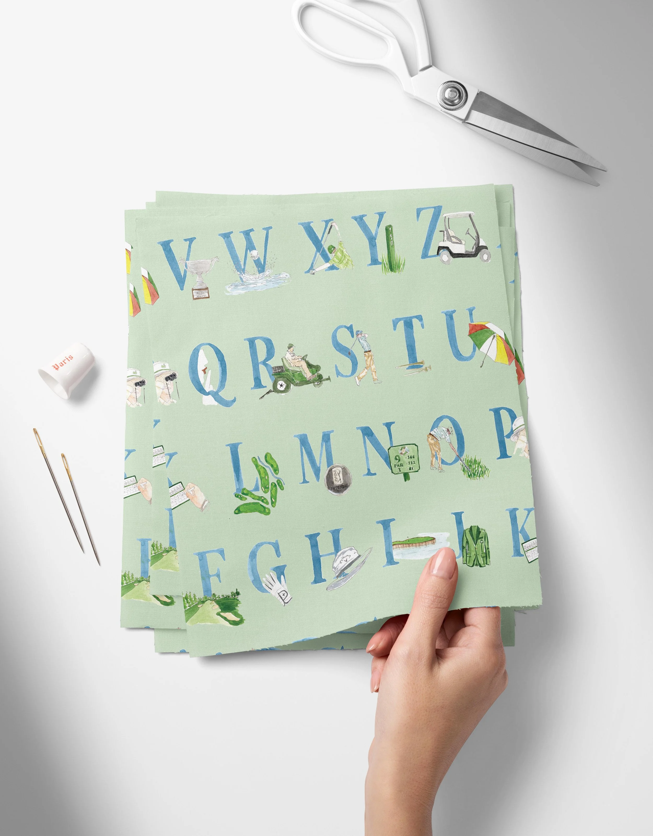 ABCs of Golf Layout Square-01-01_Top View of Fabric Swatches Held in Hand Mockup by Creatsy®.jpg