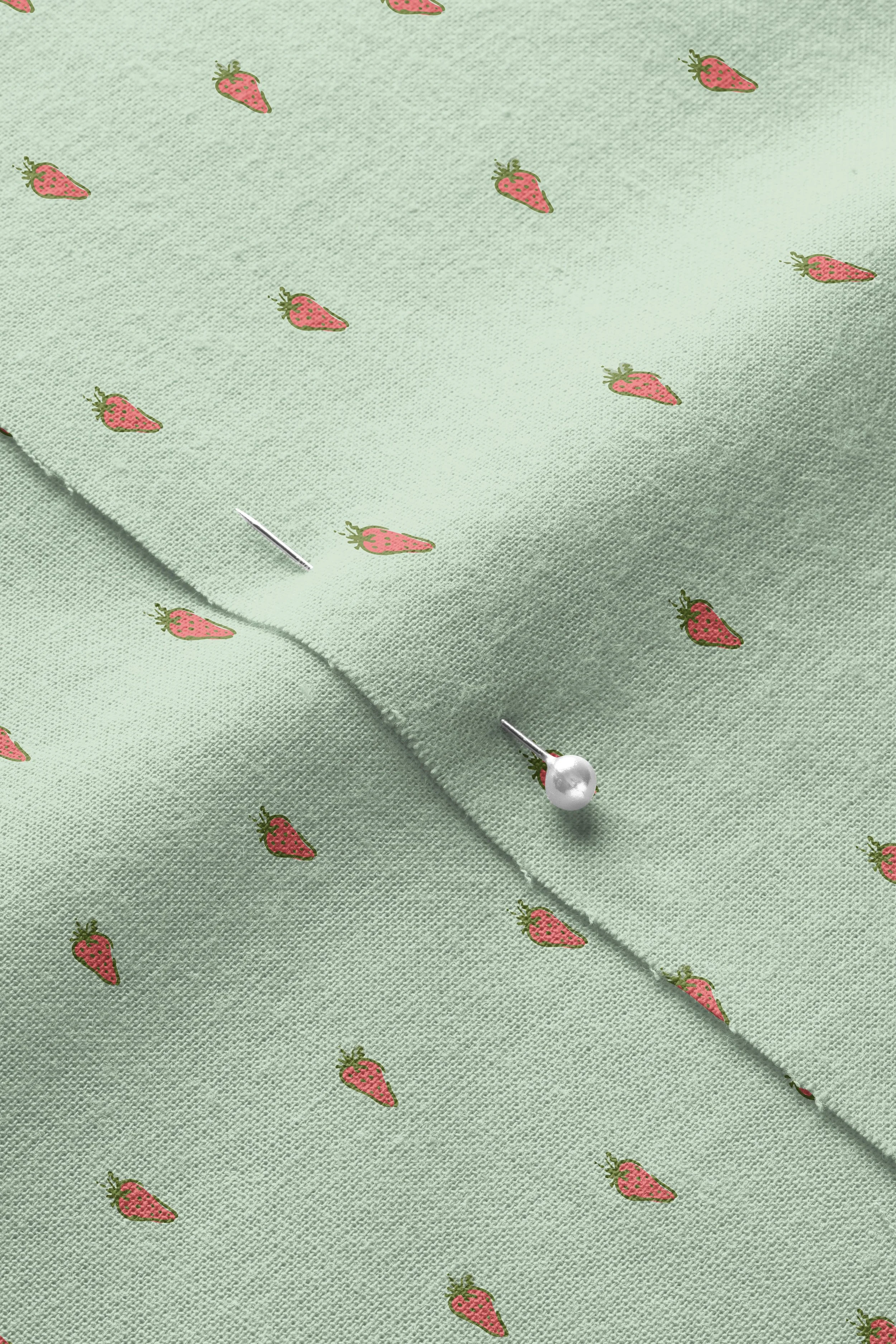 Strawberries-green-01_Closeup of Pinned Cotton Fabric Mockup by Creatsy®.jpg