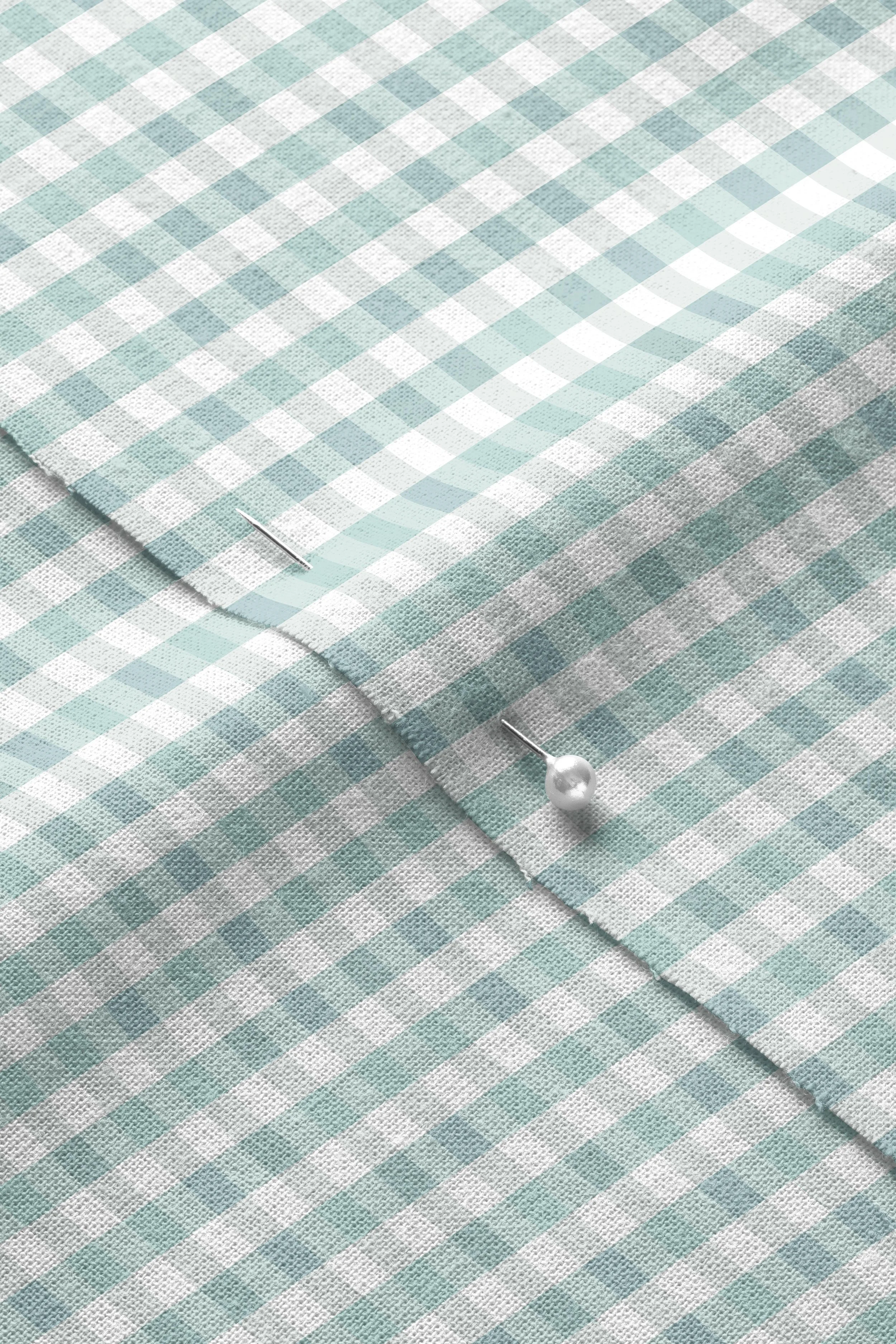 Plaid-blue-small-01_Closeup of Pinned Cotton Fabric Mockup by Creatsy®.jpg