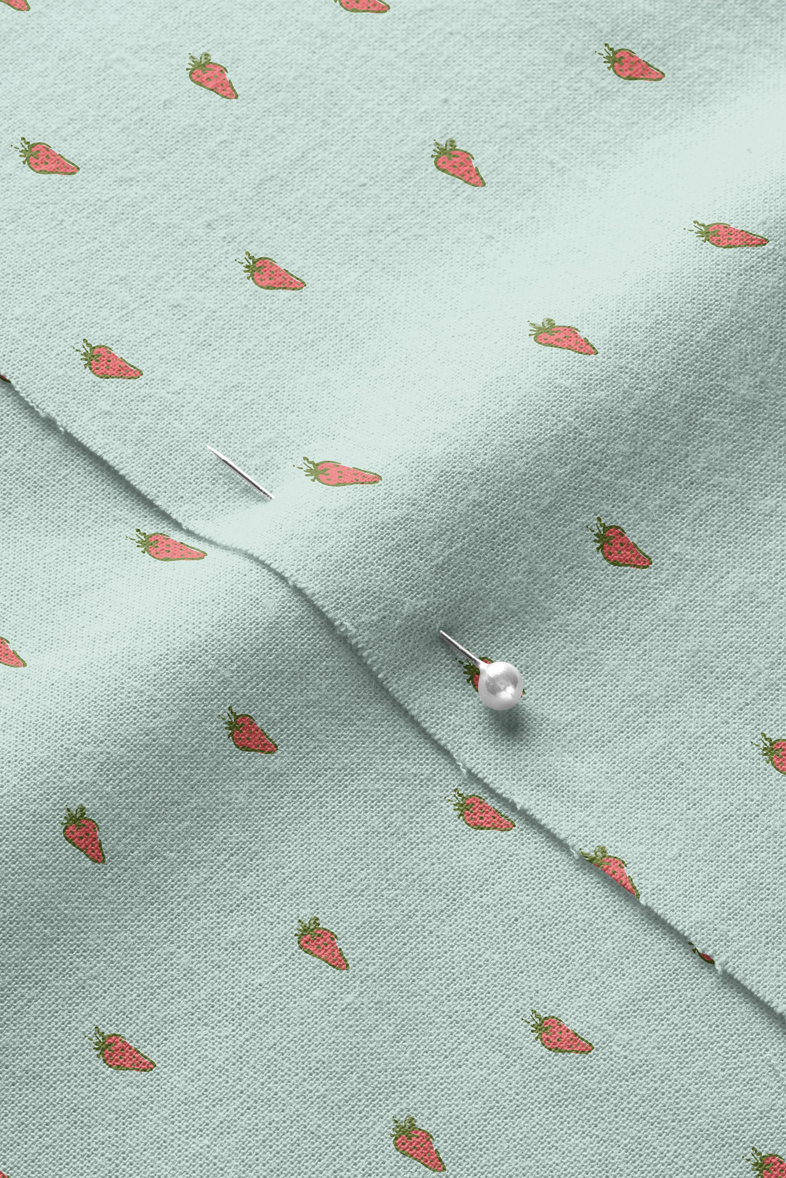 Strawberries-blue-01_Closeup of Pinned Cotton Fabric Mockup by Creatsy®.jpg